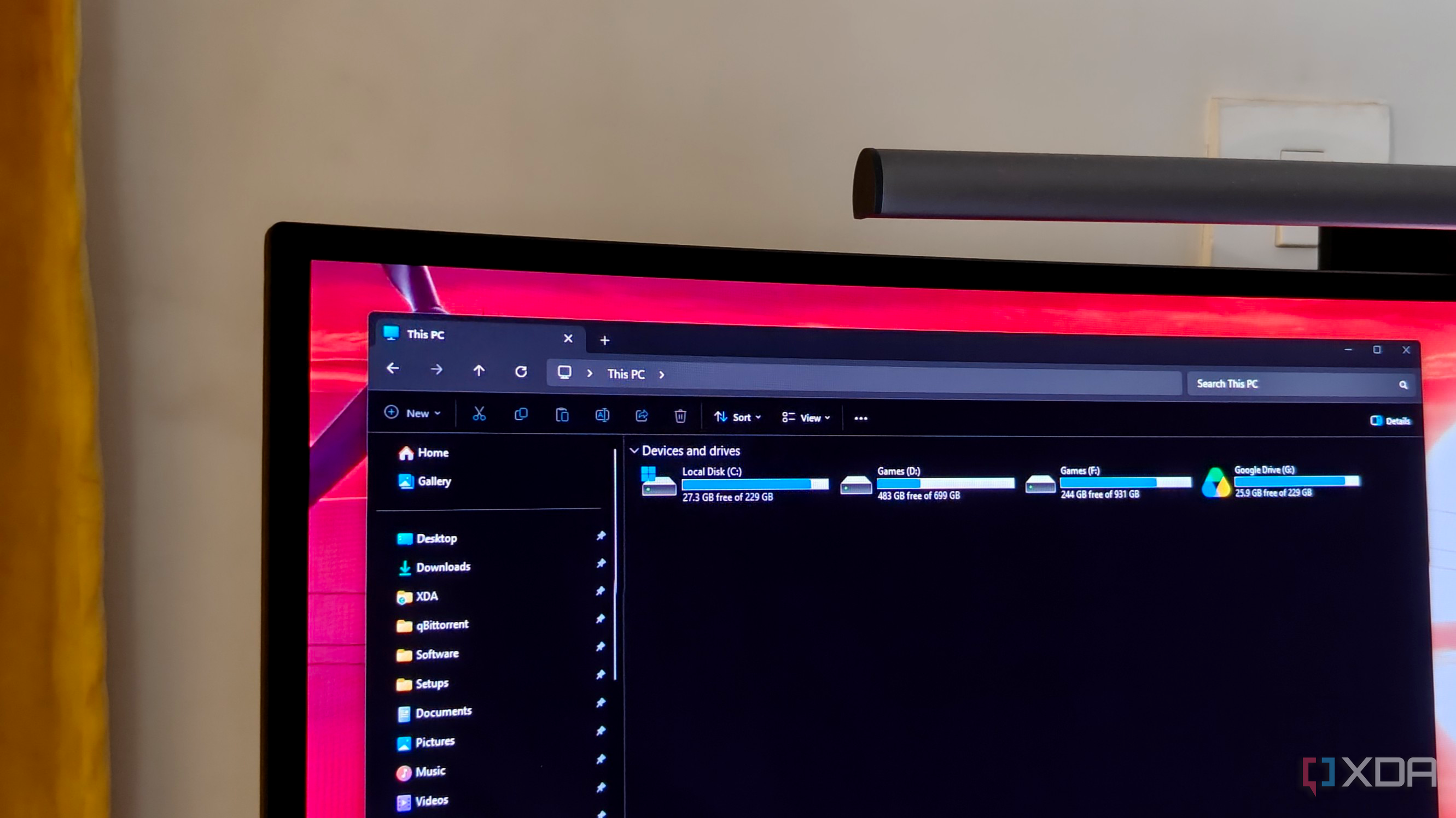 Close-up of an ultrawide monitor showing all the system partitions