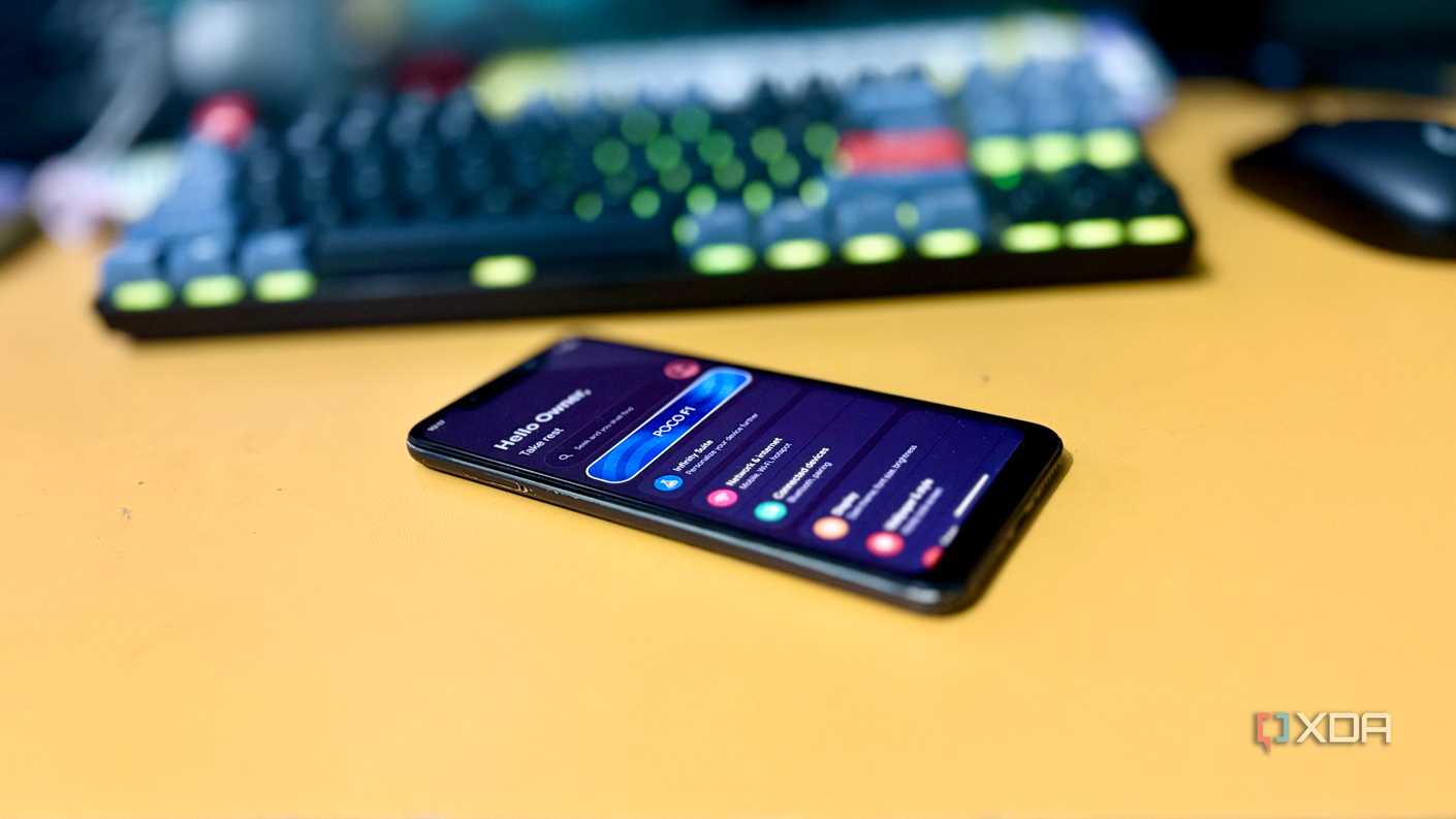 Old POCO F1 sitting unused next to a mechanical keyboard