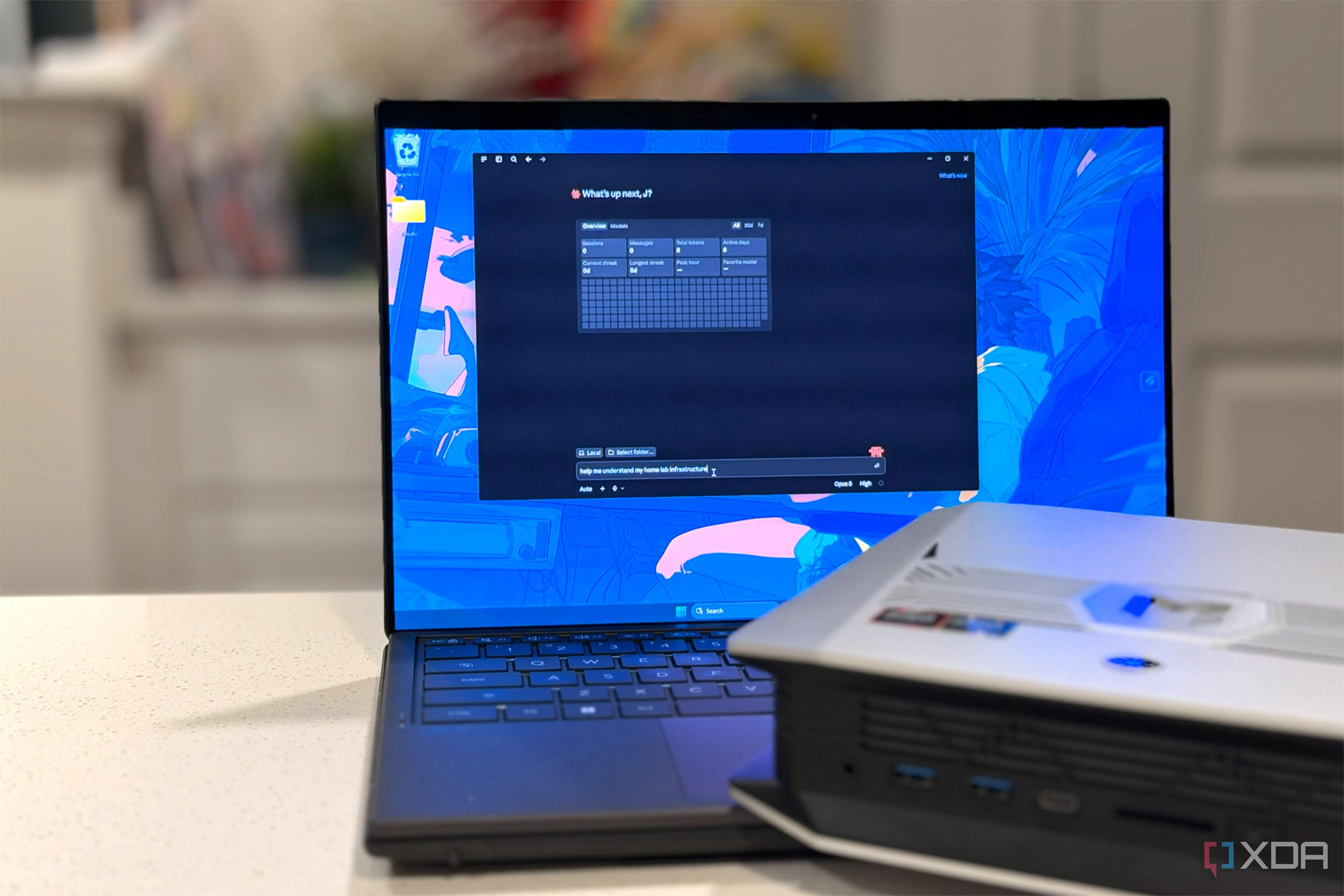 proxmox server mini pc in front of claude window
