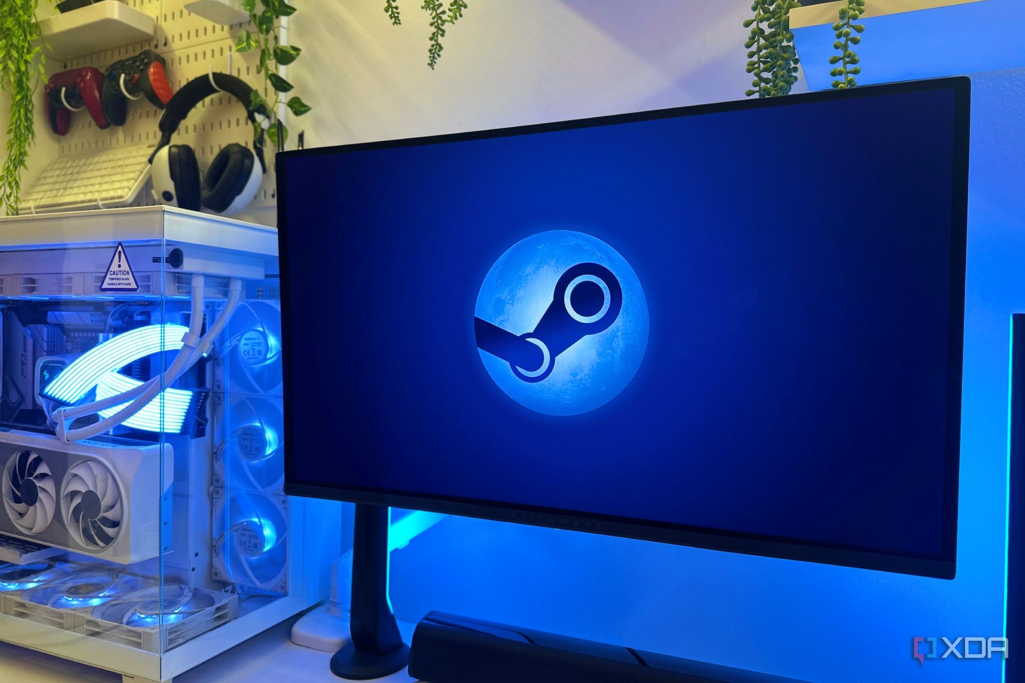 Steam wallpaper on OLED monitor in a gaming PC.