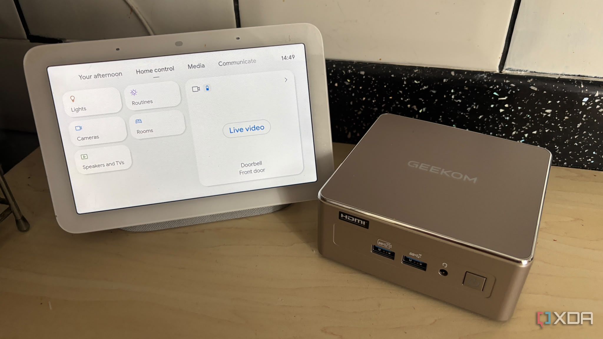 Geekom A5 2027 Mini PC next to google home