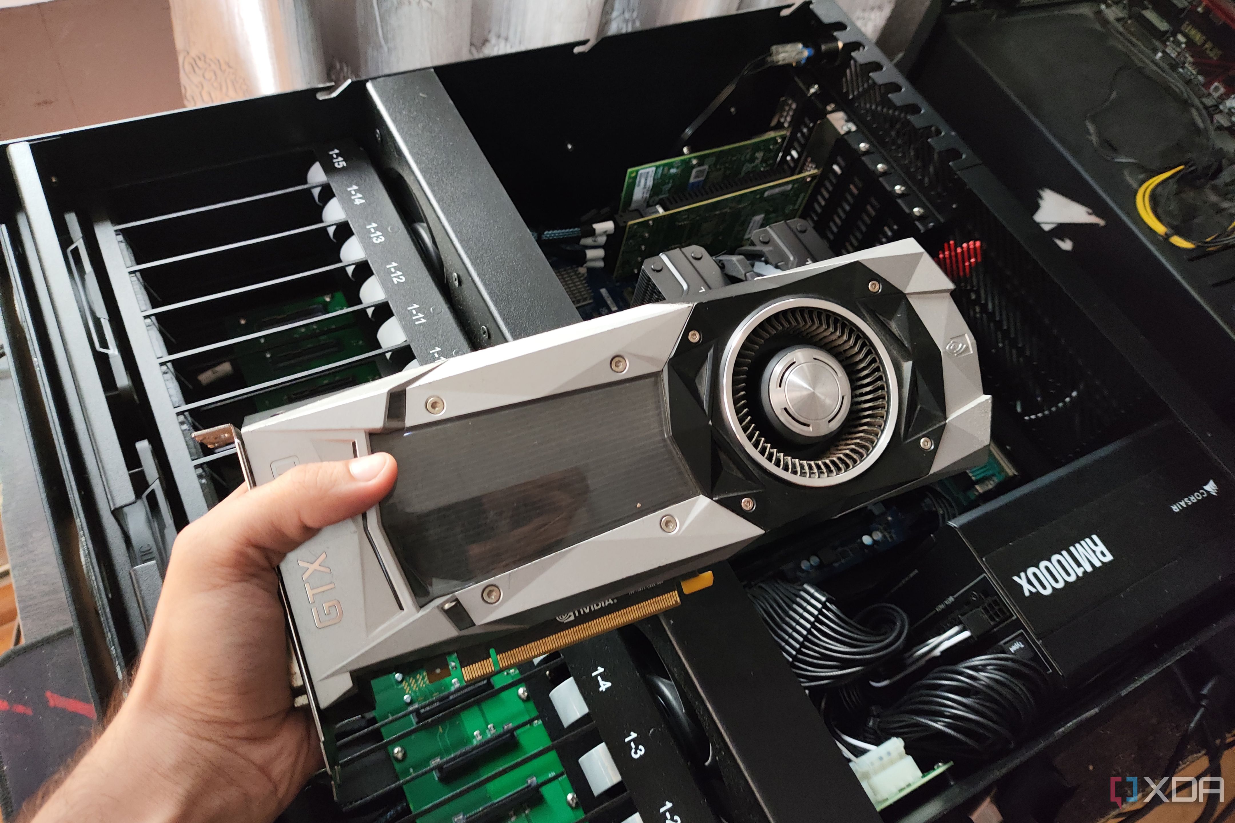 A person holding a GTX 1080