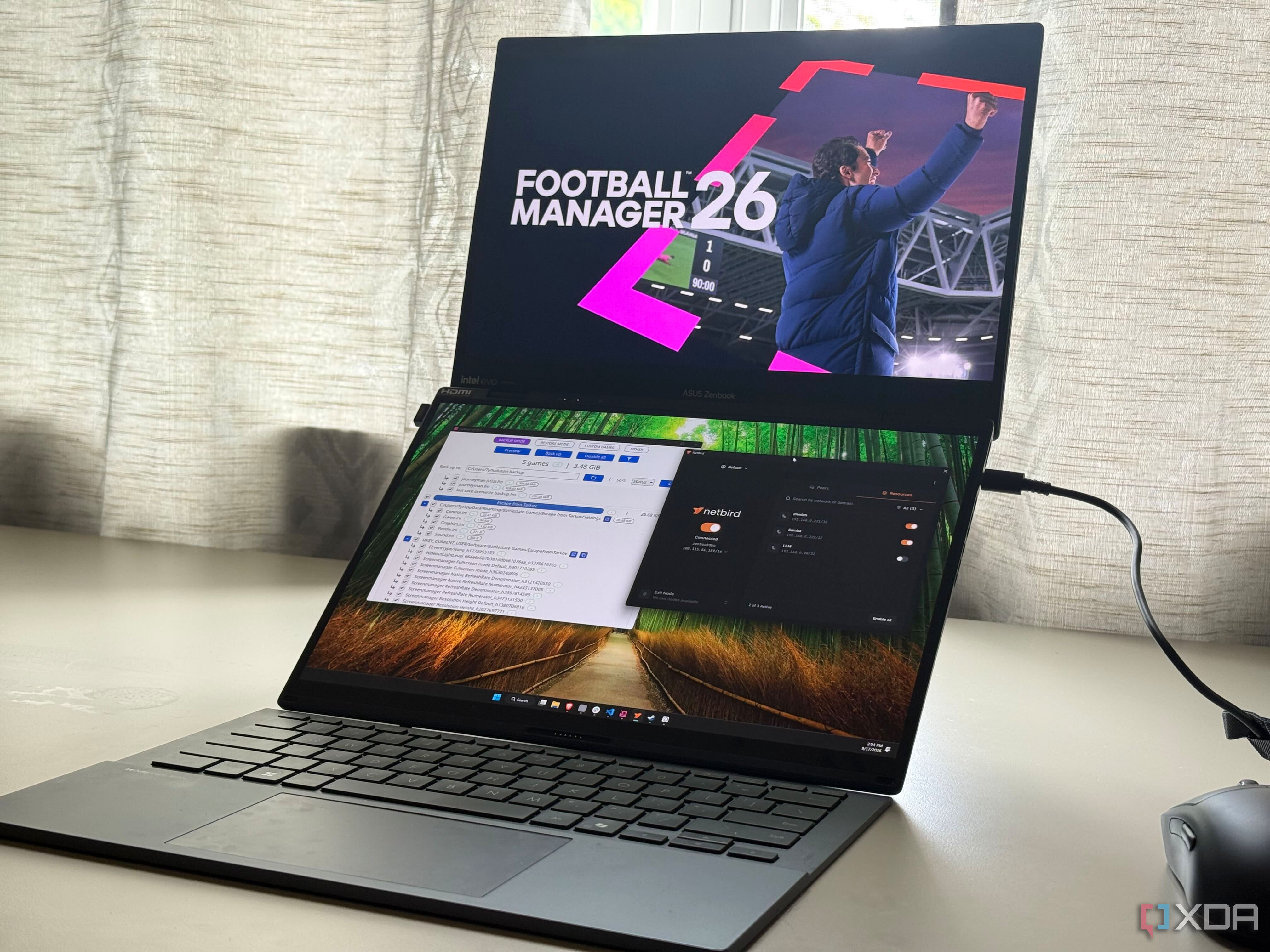 A laptop with football manager open