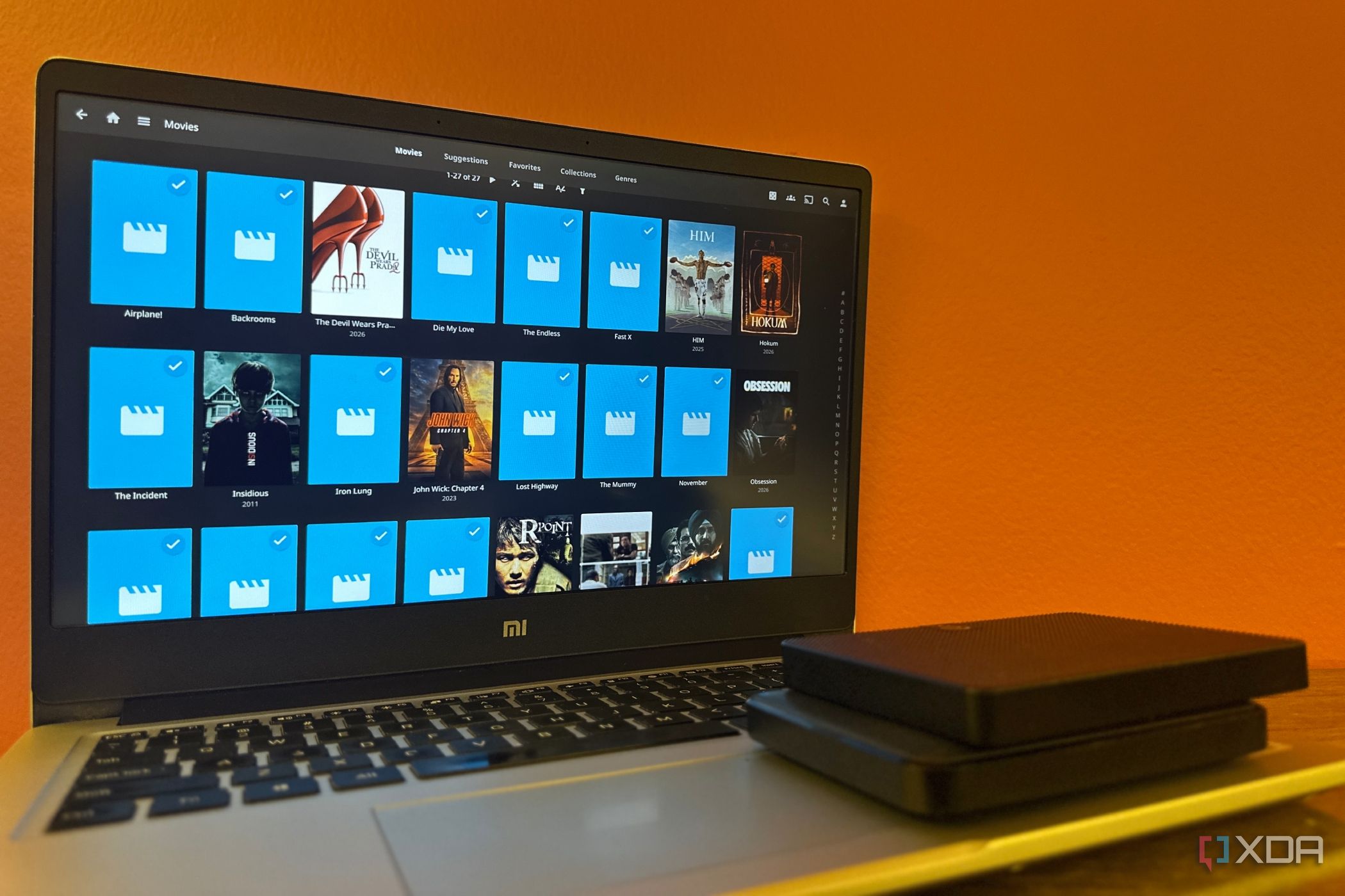 Jellyfin server running on a laptop with external HDDs and missing metadata.
