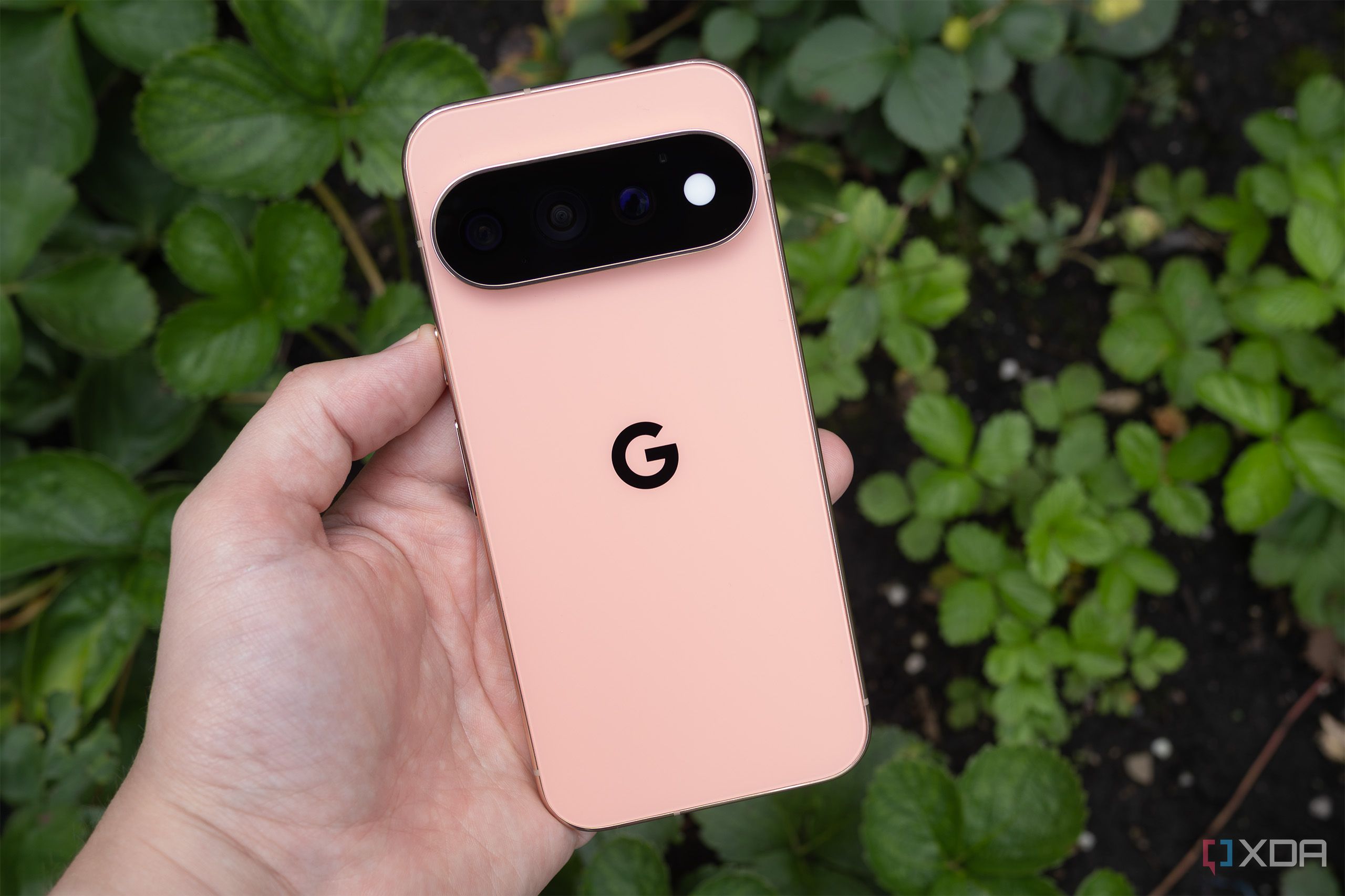 The Pixel 11 Pro being held 