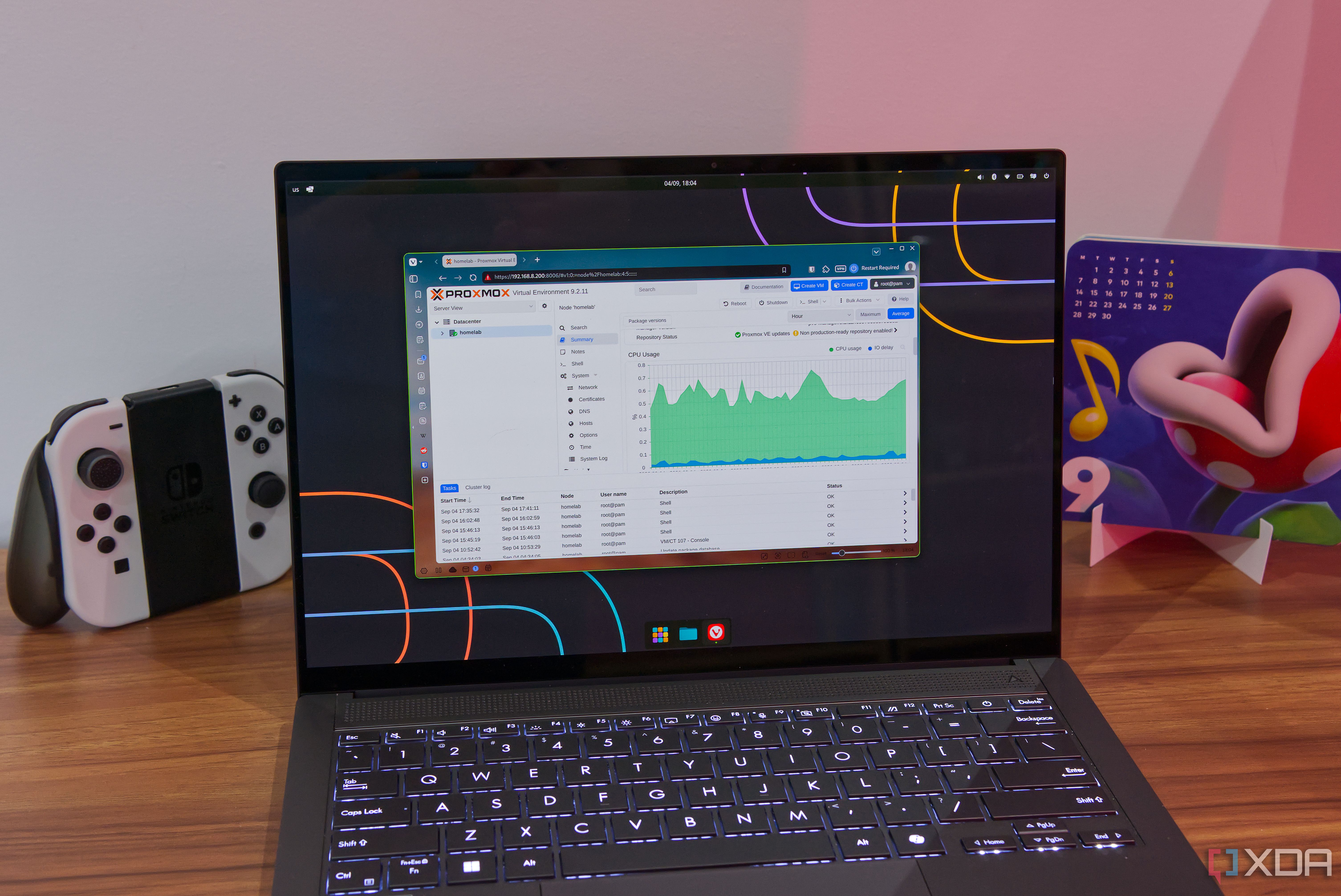 A laptop displaying a Proxmox dashbaord, where the CPUusage of a server is shown in a graph