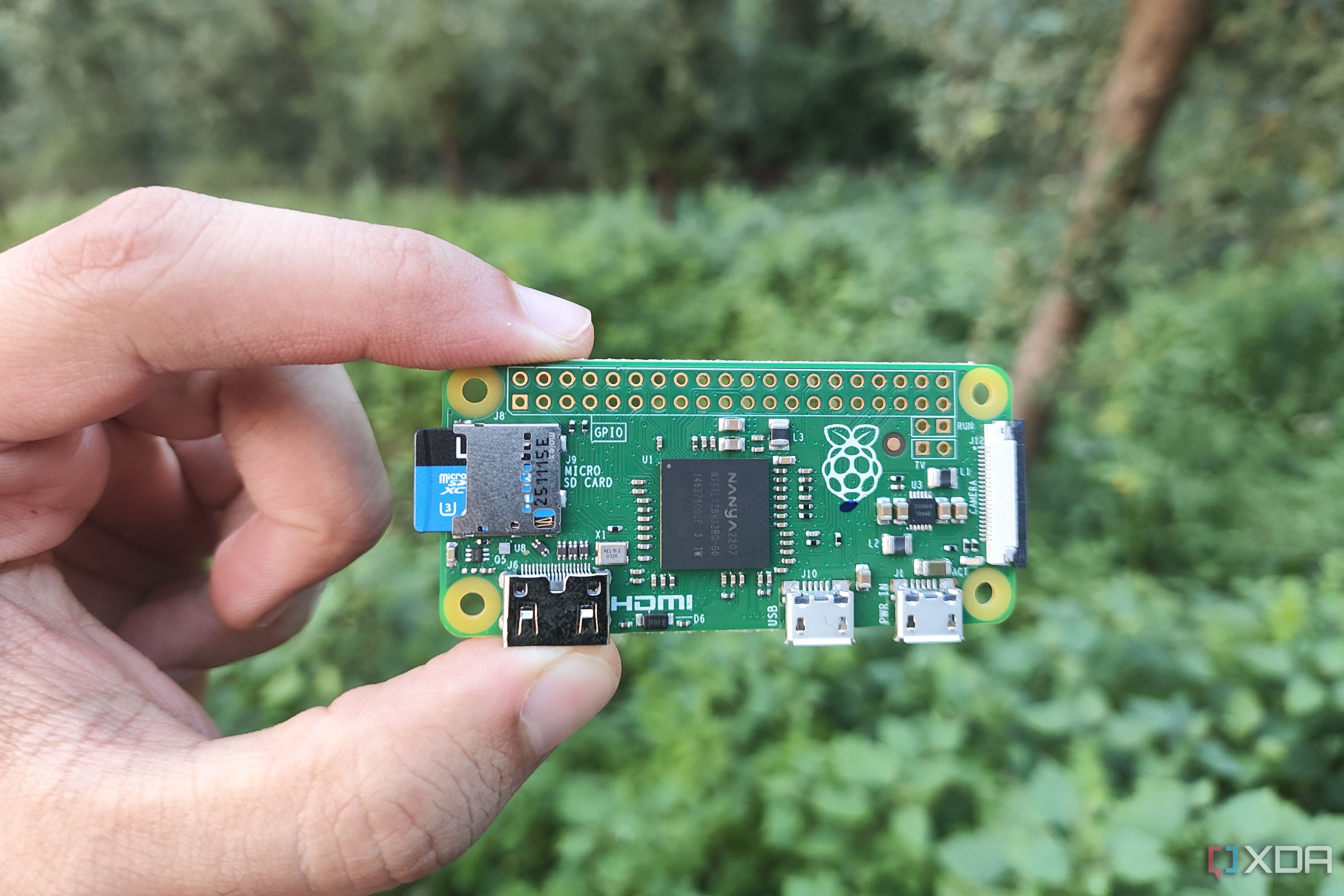 A person holding a Raspberry Pi Zero