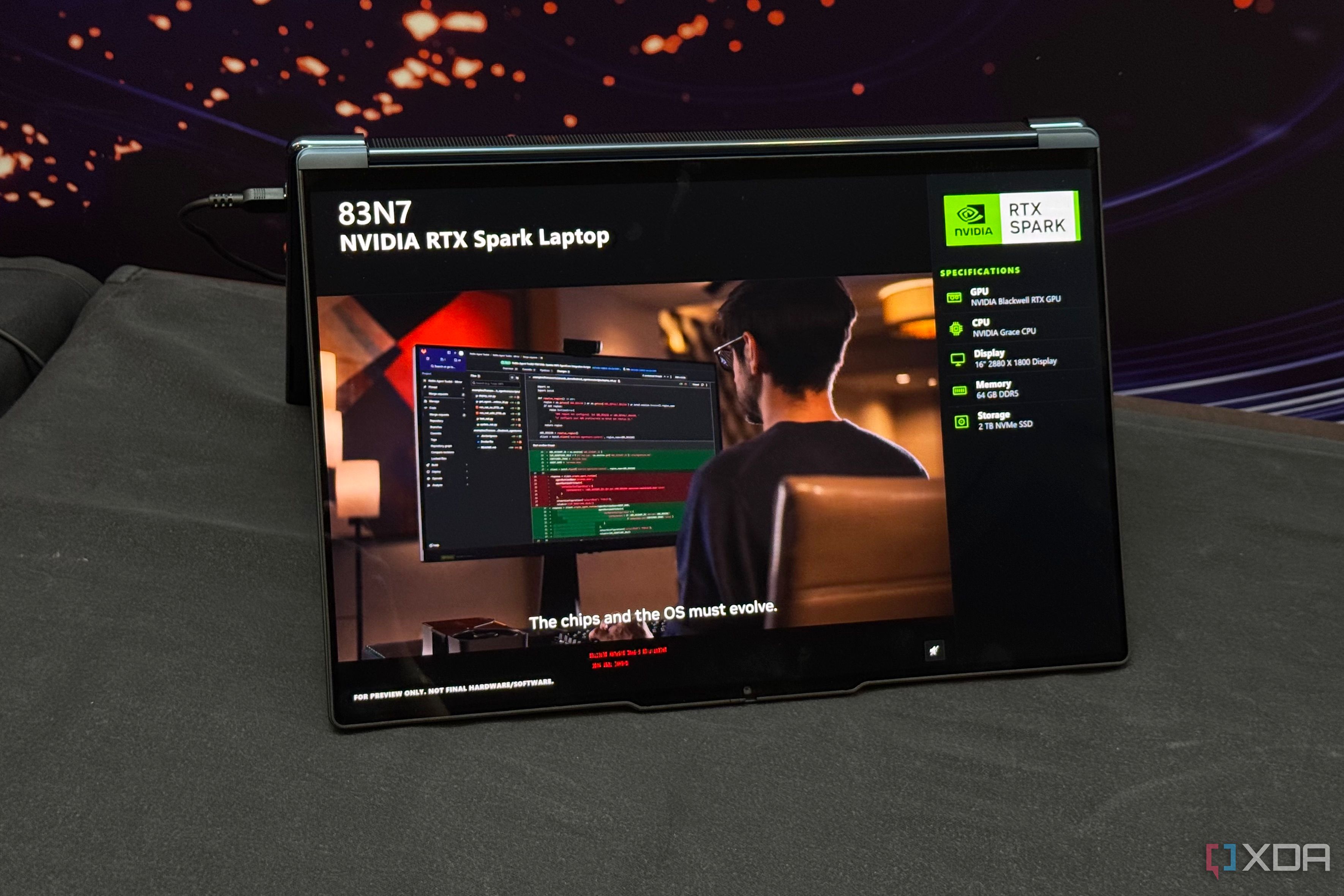 RTX Spark laptop in tent mode with a slide reading The chips and the OS must evolve