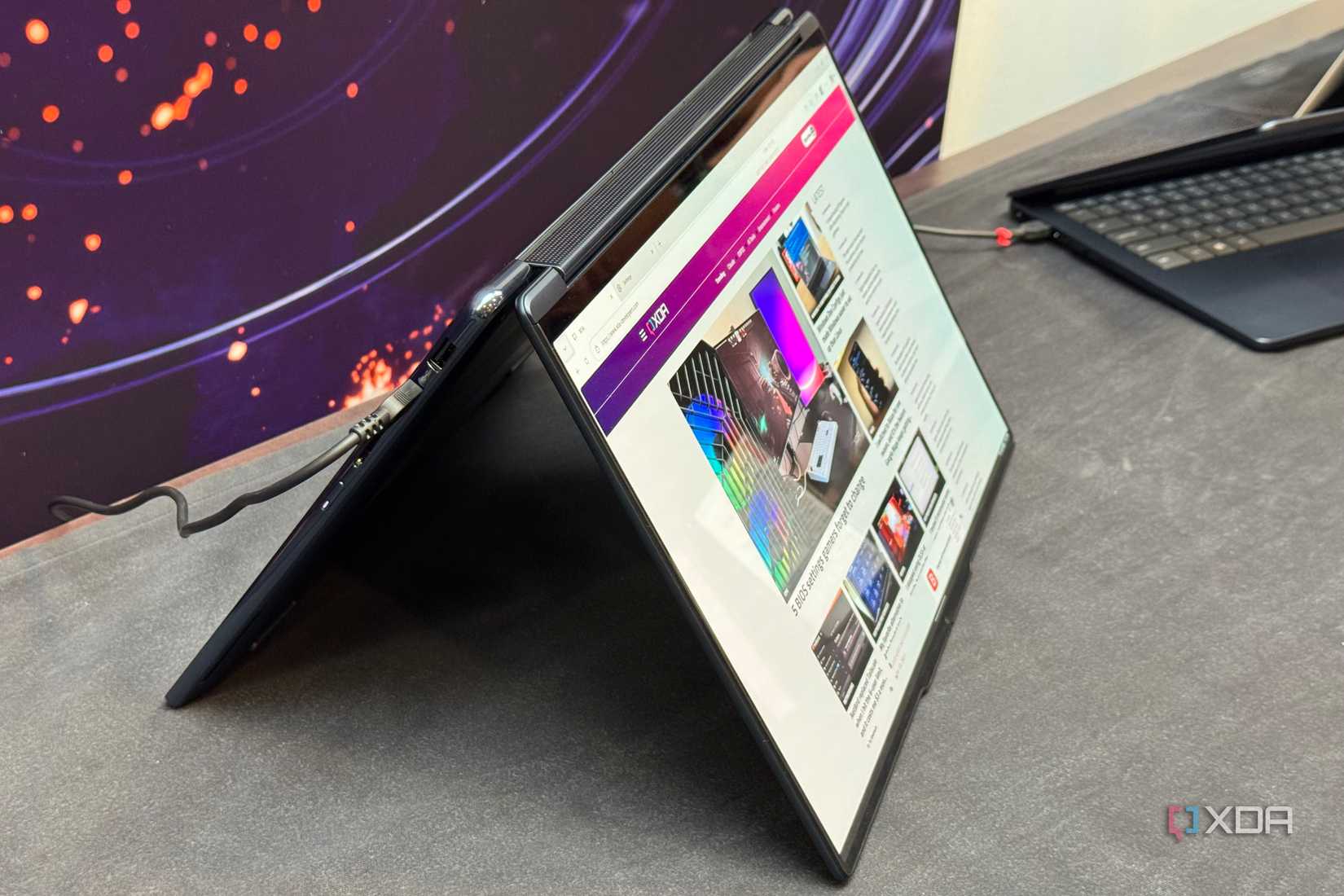 Side profile of the RTX Spark laptop folded into tent mode