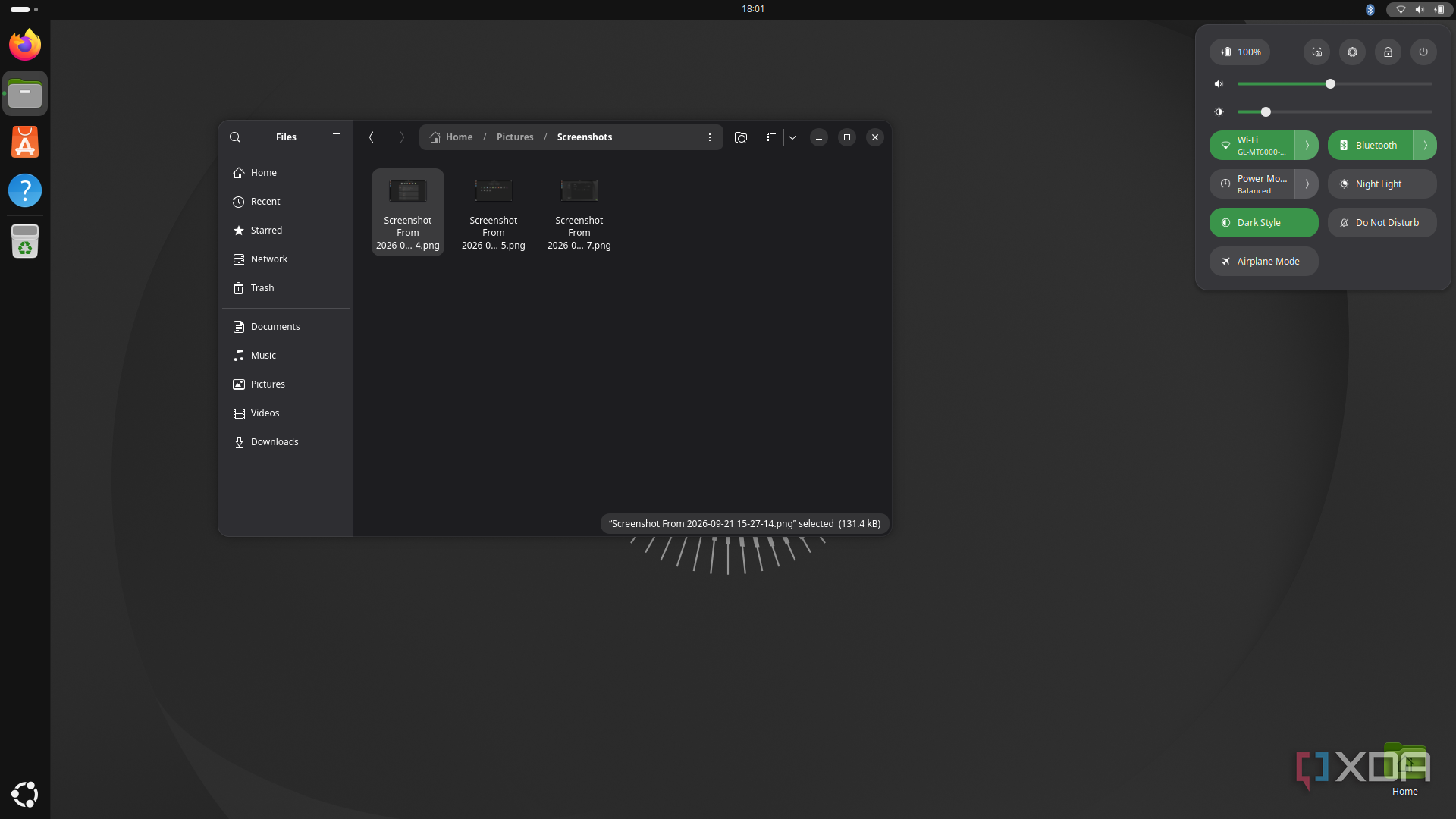 Screenshot of an Ubuntu desktop showing the file manager and the system control flyout in the top right corner