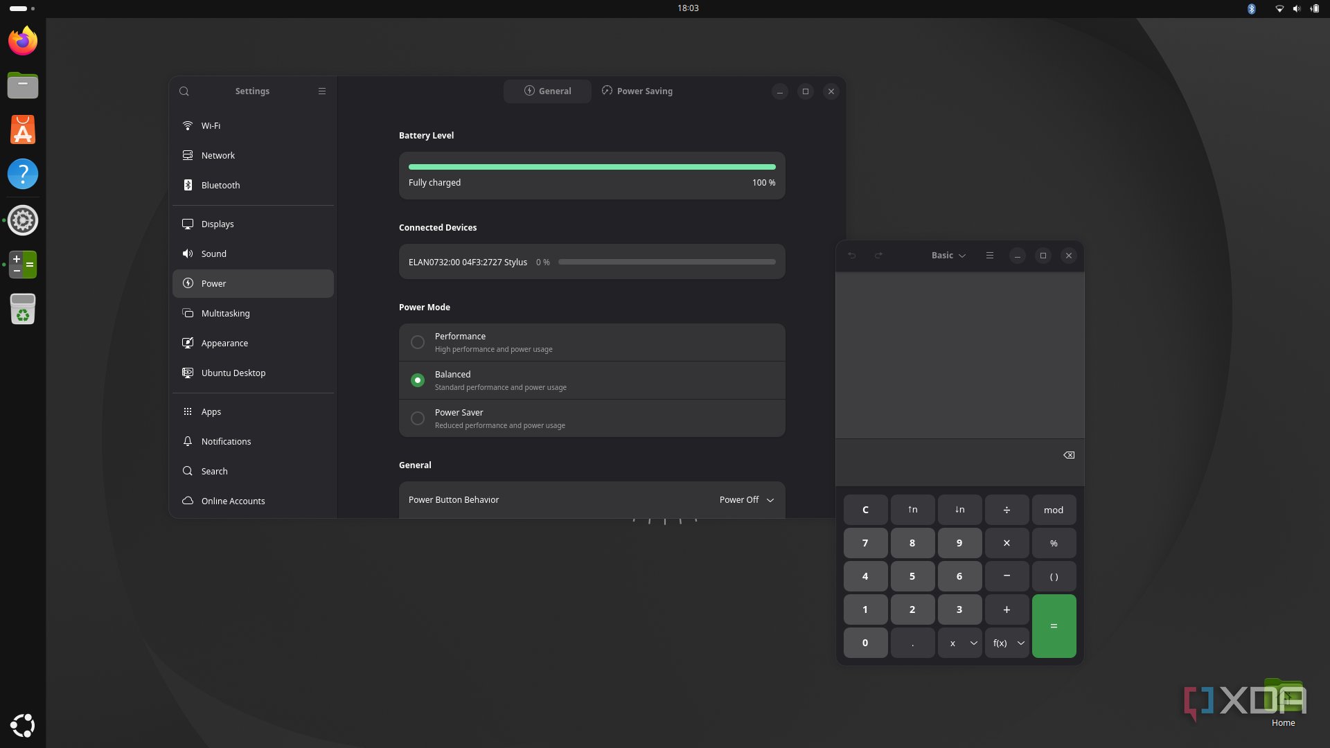 Screenshot of the Settings and Calculator apps in Ubuntu using the GNOME desktop