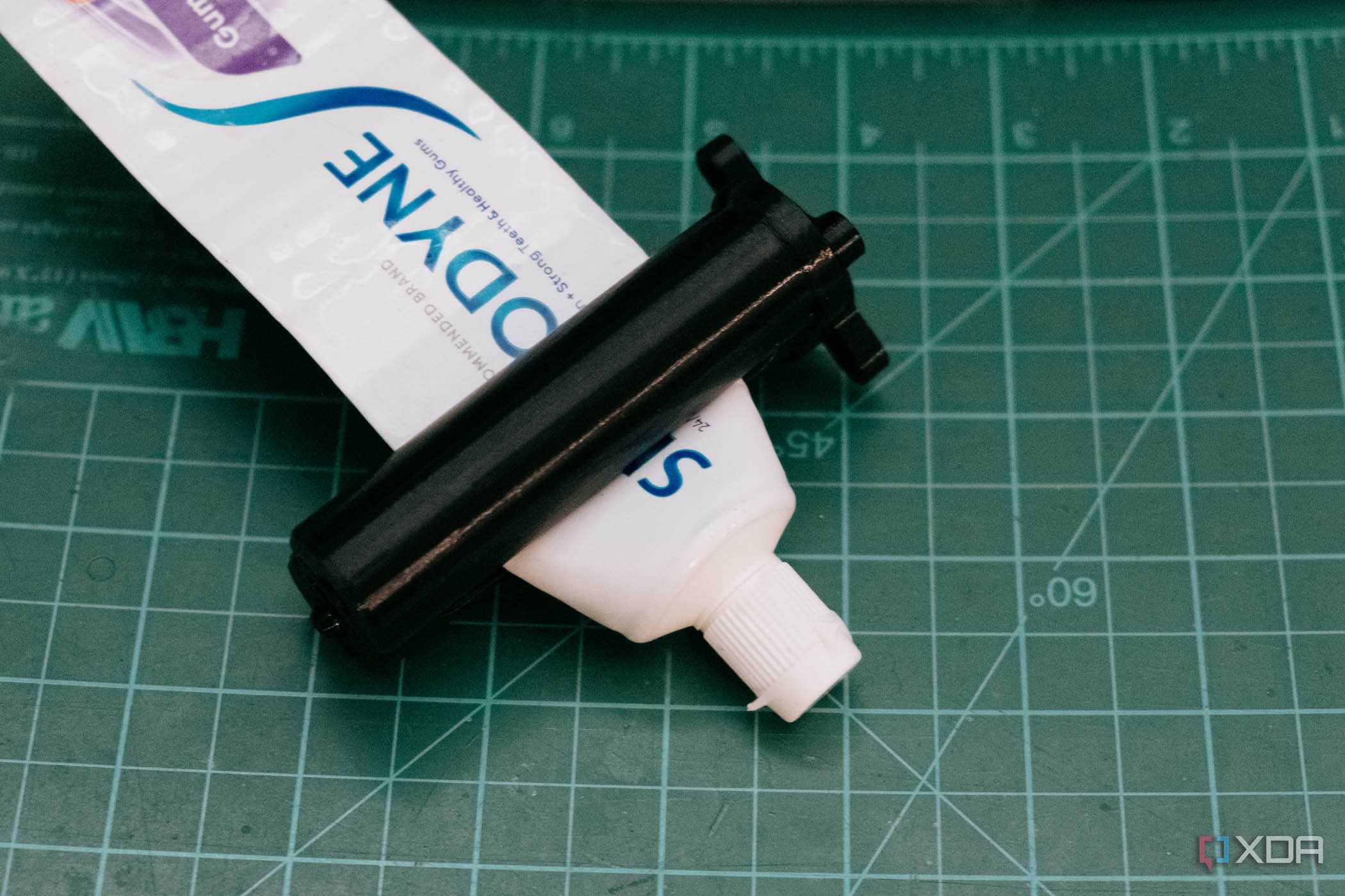 3D-printed toothpaste squeezer in use