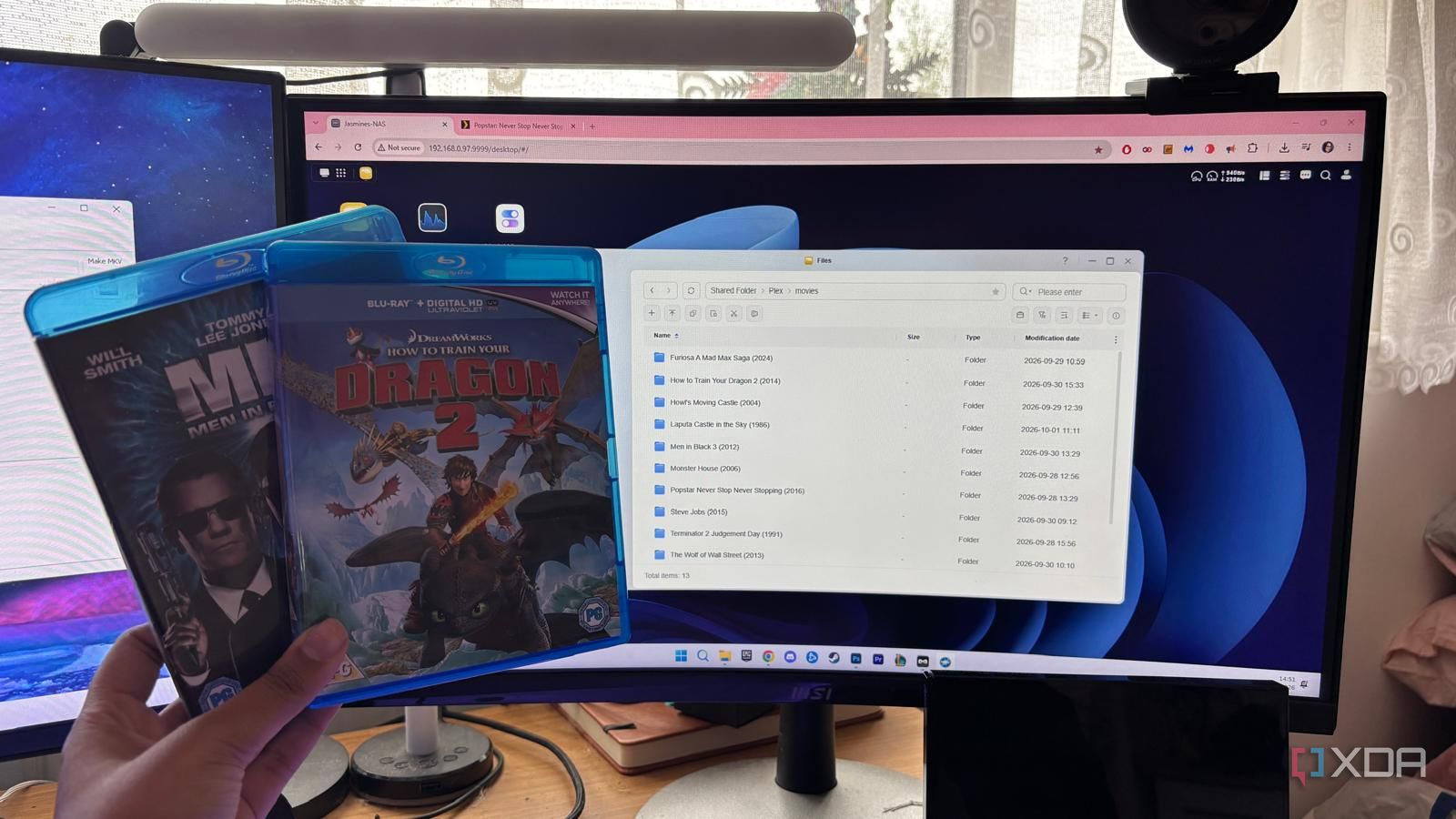 blurays held up in front of plex media library files