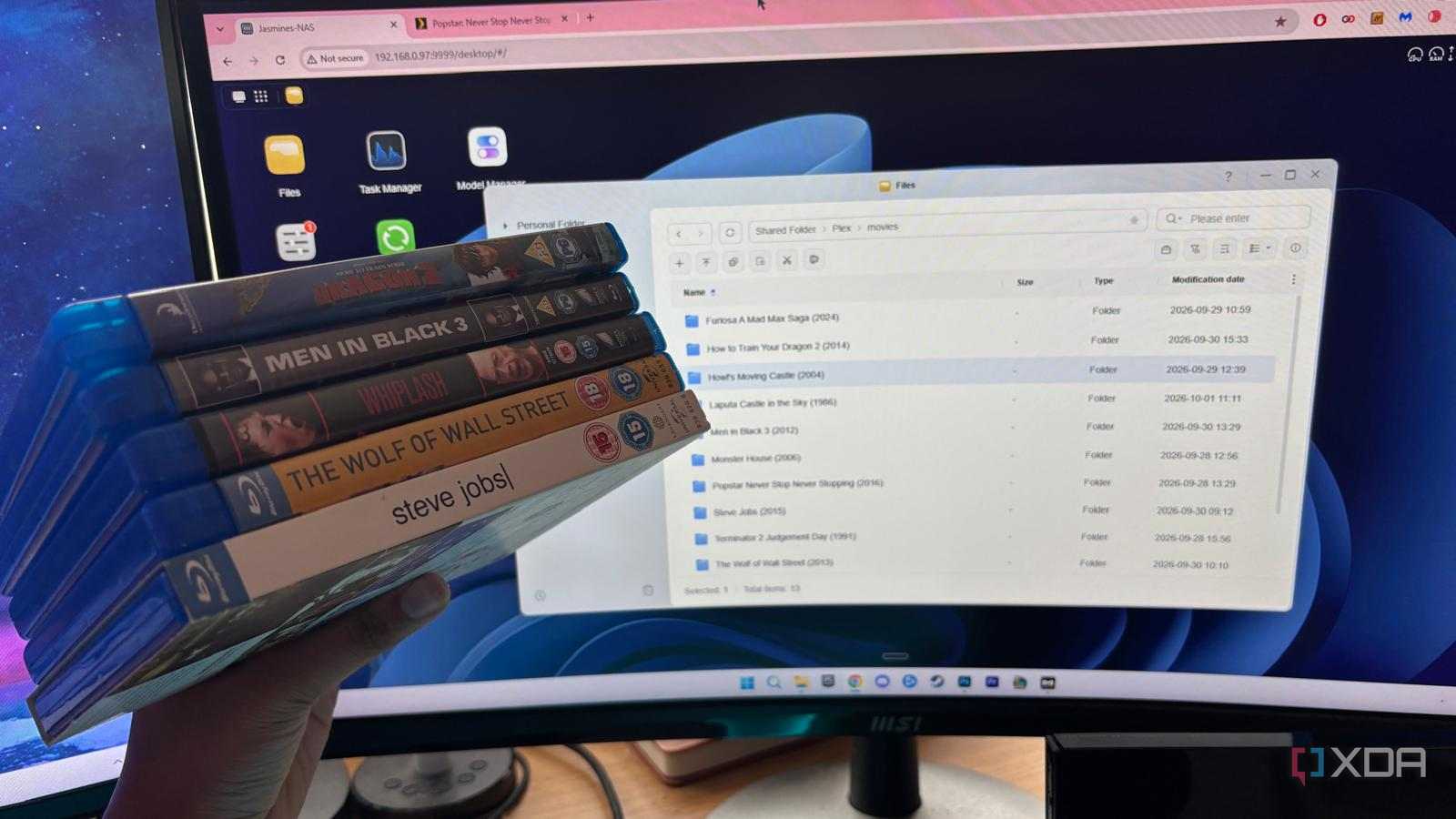 blurays held up in front of plex media library files
