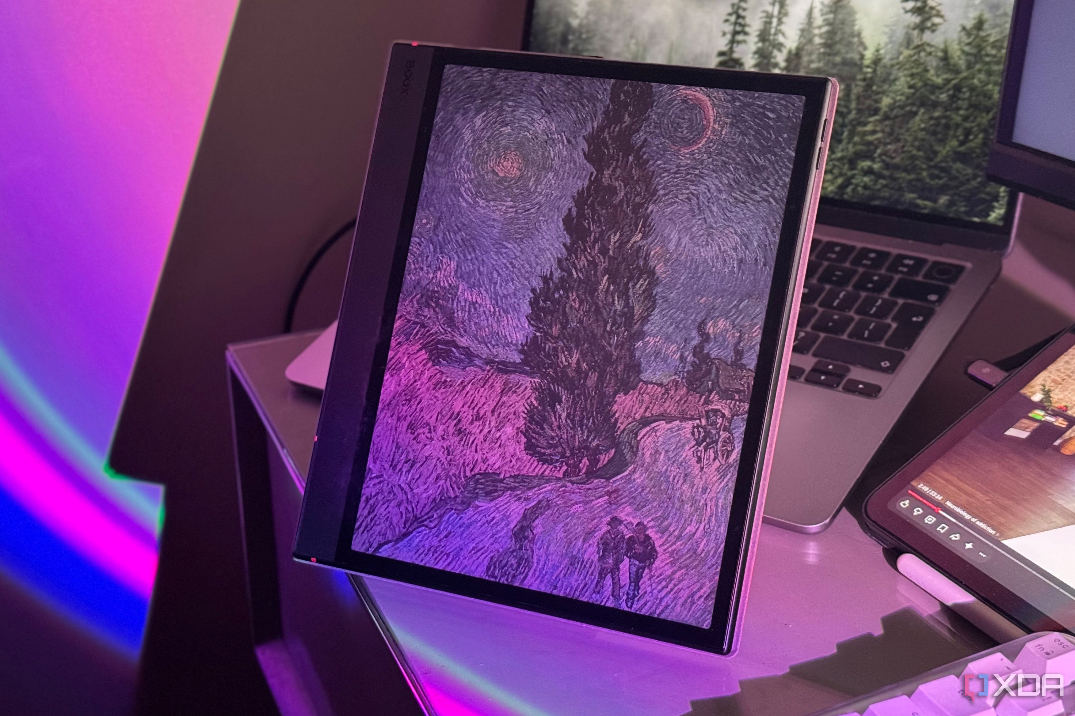 Boox color E Ink tablet displaying Van Gogh's Road with Cypress and Star on a desk
