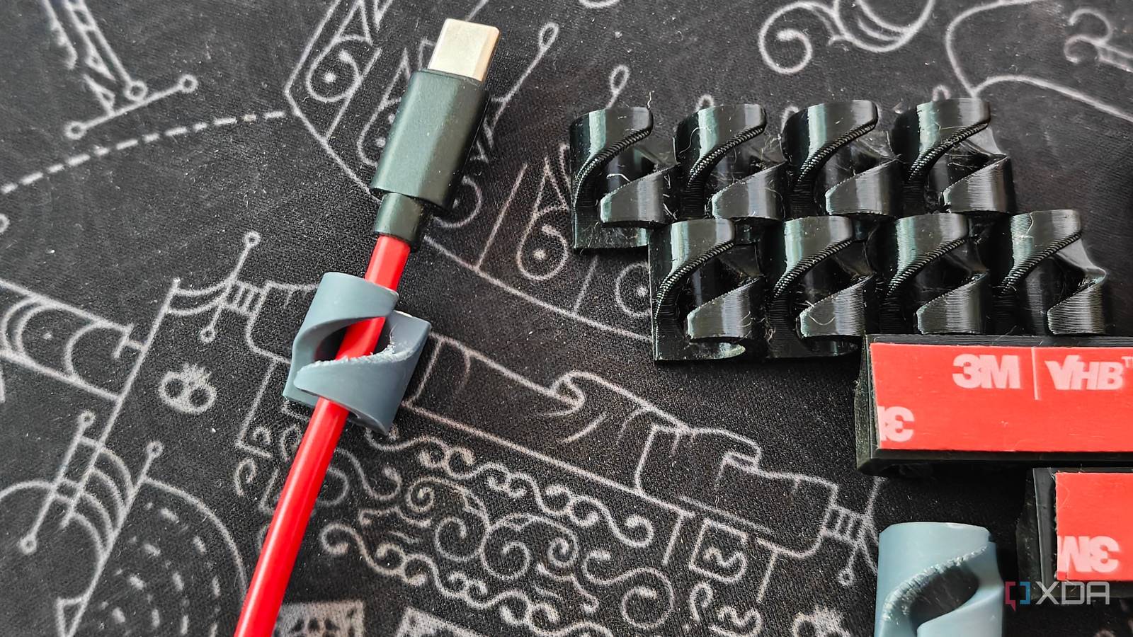 I stopped buying cable organizers once I started 3D printing my own