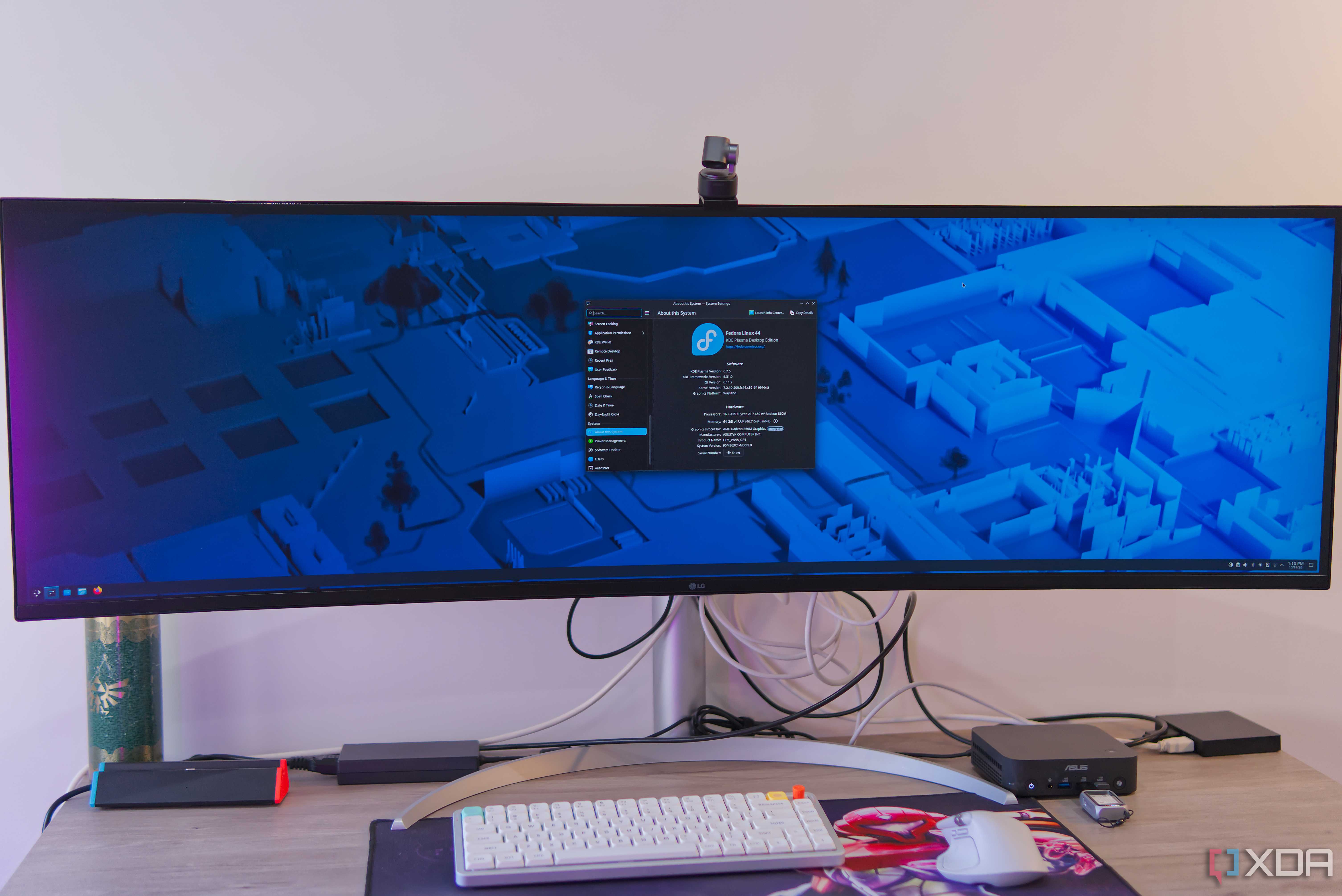 An ultrawide monitor connected to a PC running Fedora KDE Plasma off of a USB drive