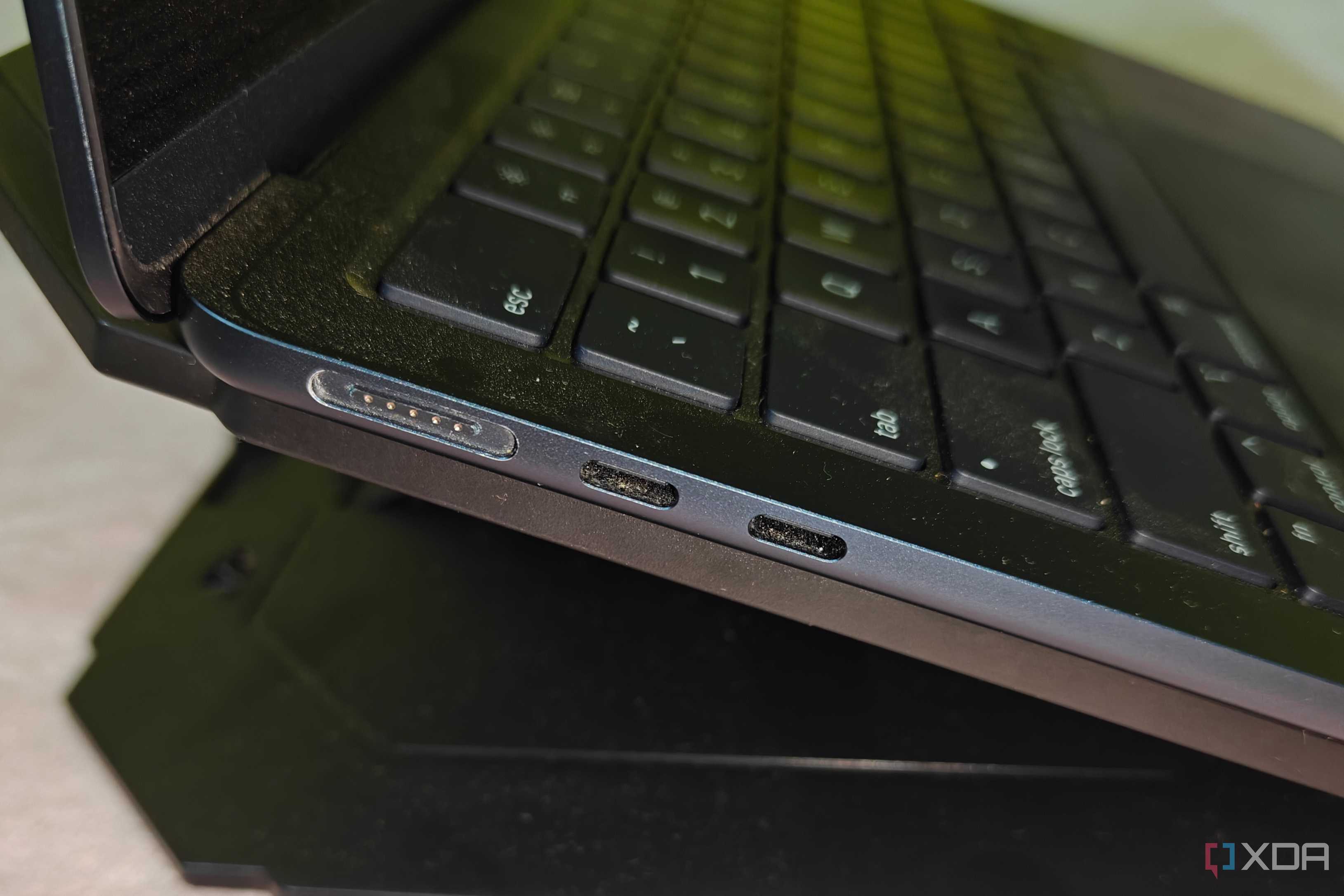 both USB 4 and Magsafe ports of macbook shot from side