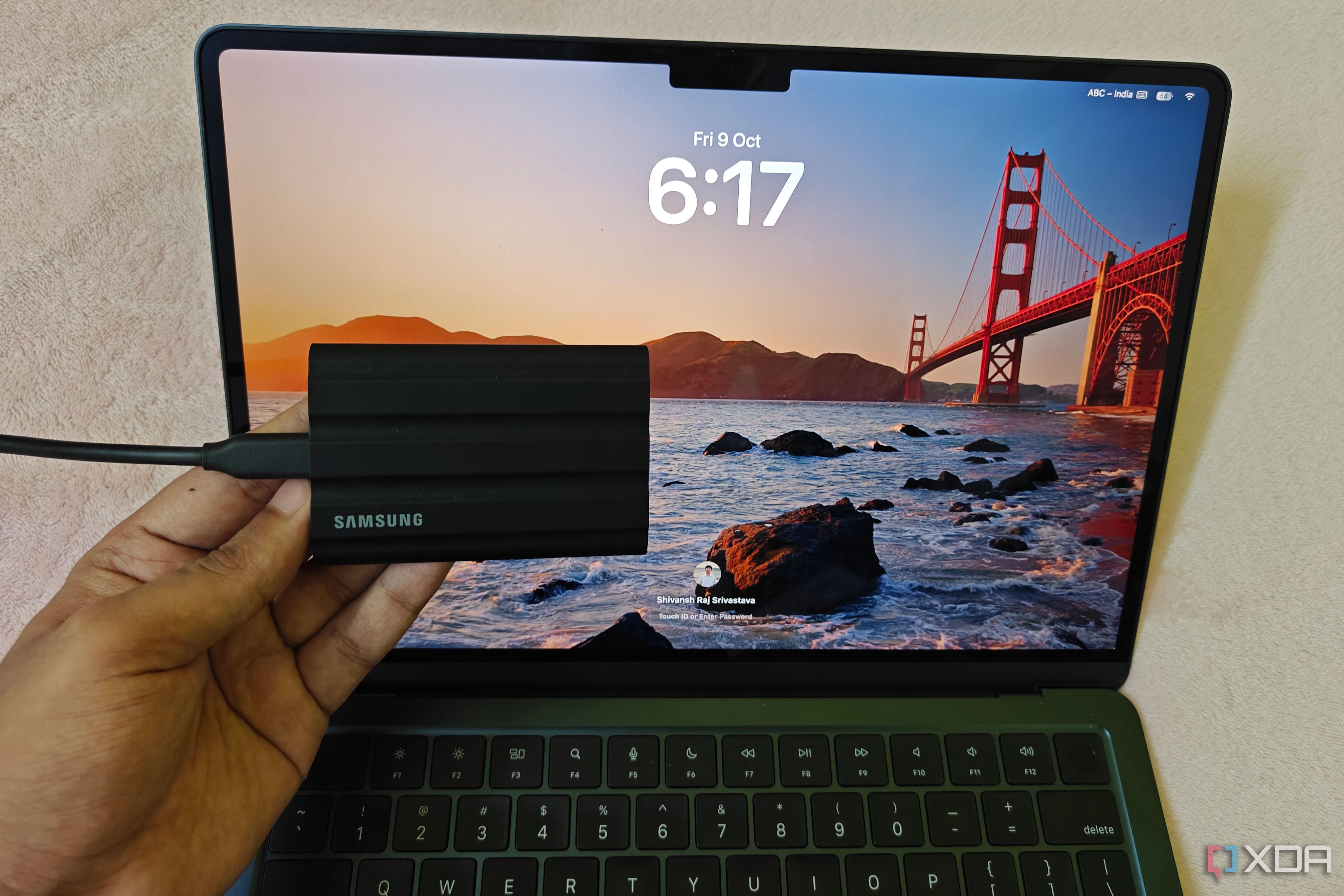 macbook air locked with Samsung T7 SSD in front of it