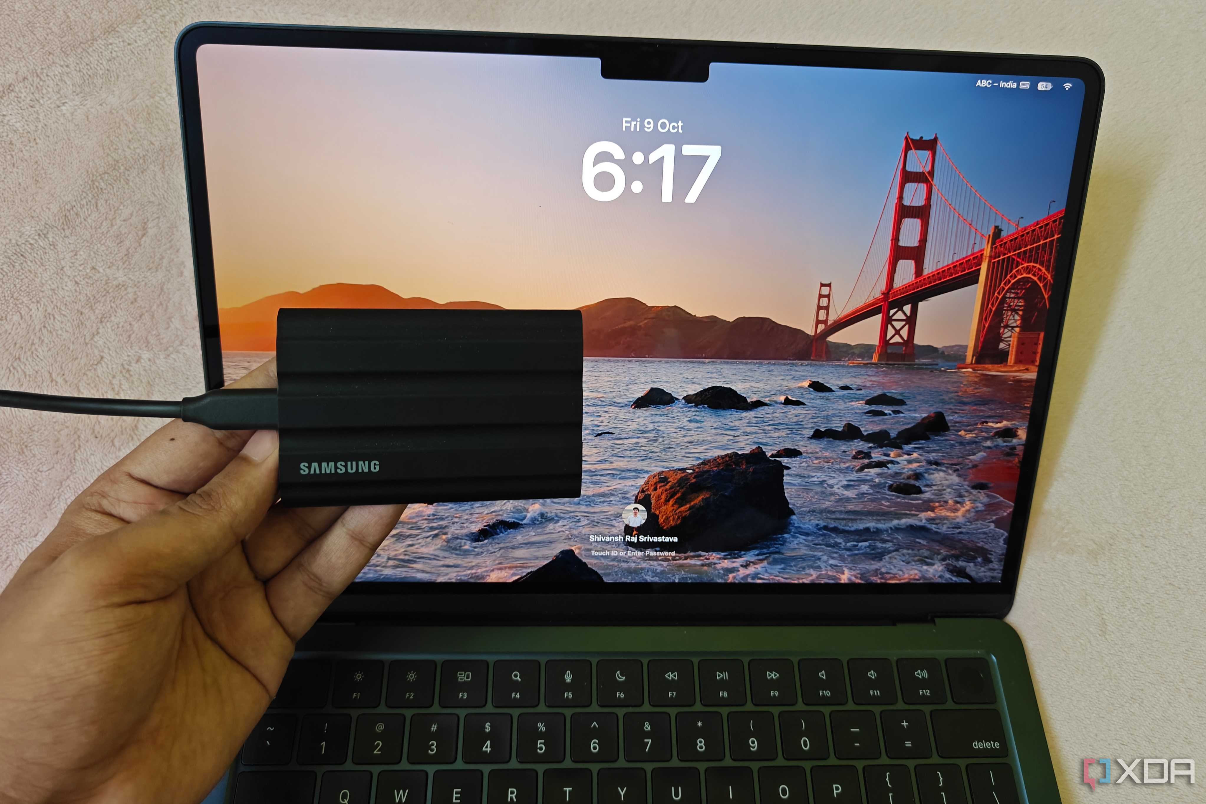 macbook air locked with Samsung T7 SSD in front of it