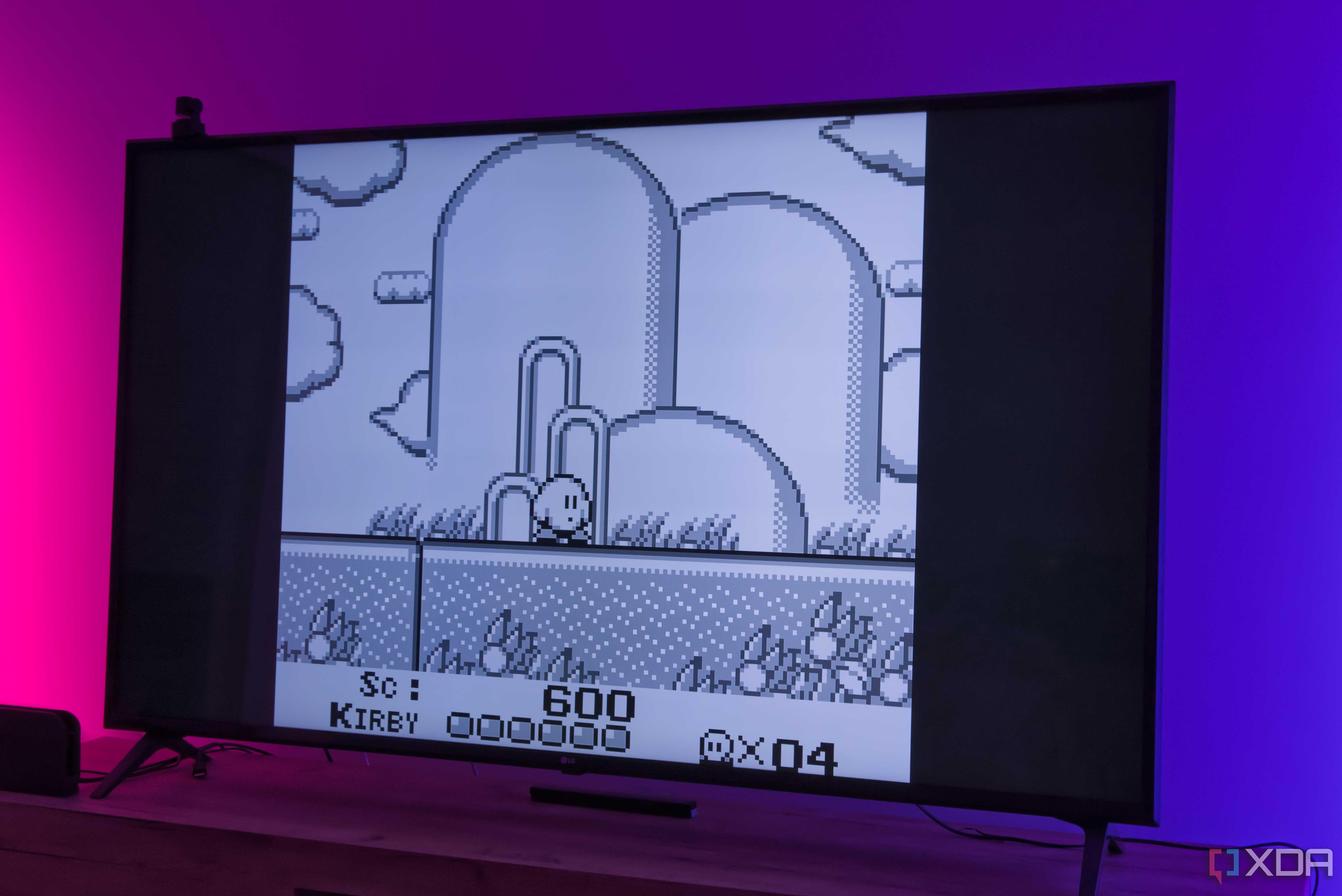 A TV displaying a level in Kirby's Dream Land running on RetroArch