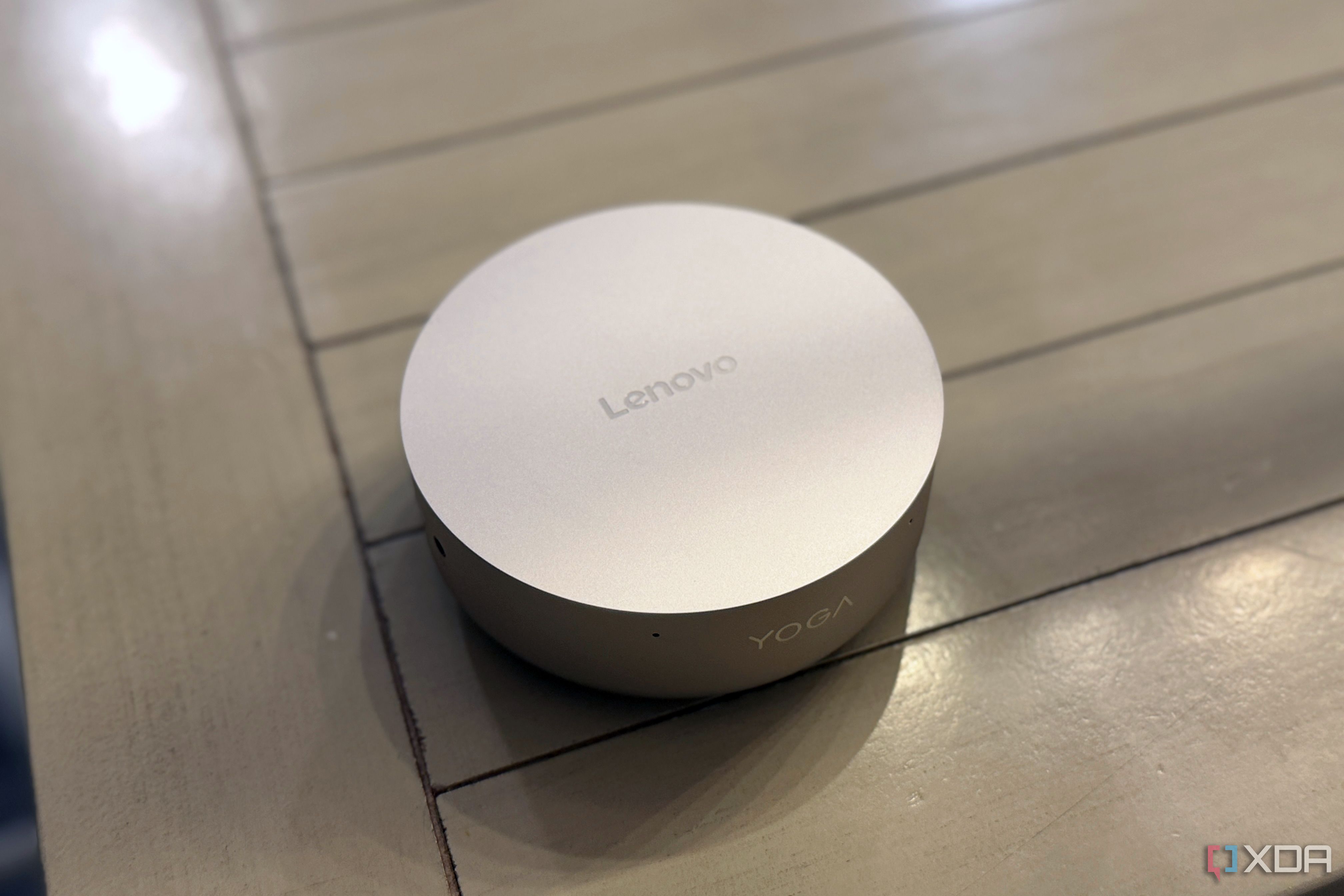Lenovo's tiny AI PC ditches the box, and it's the smartest form factor ...
