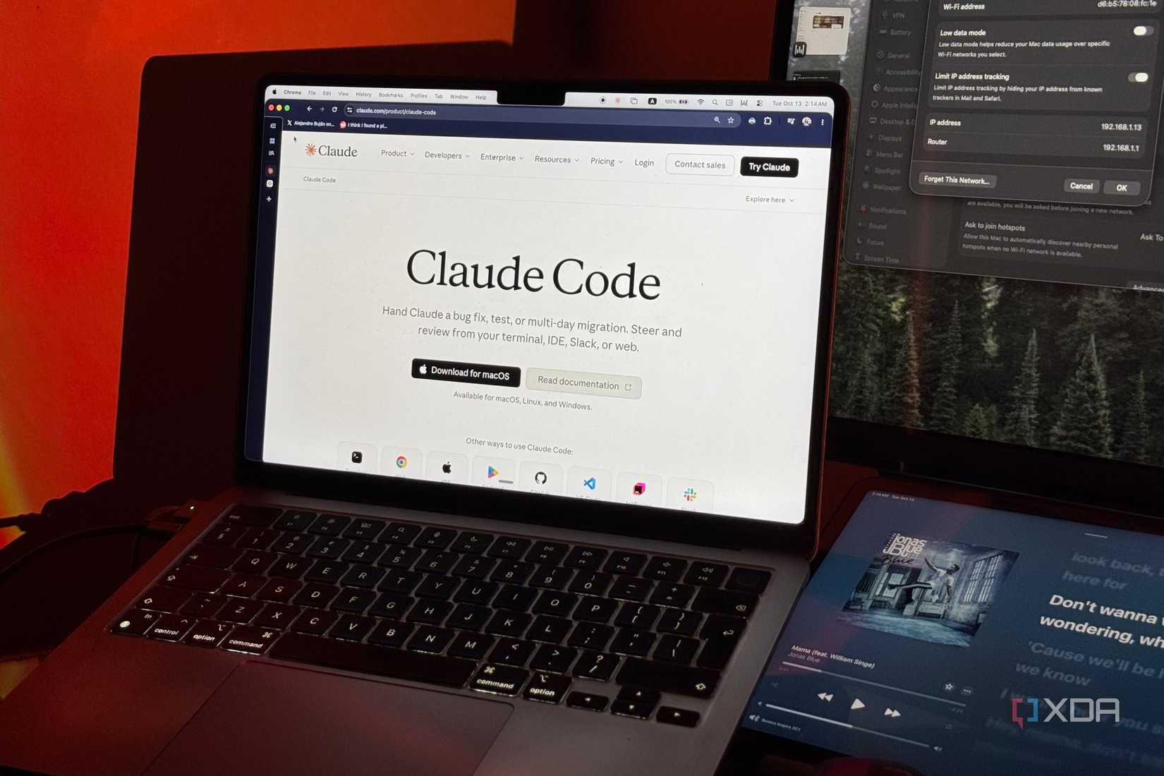 MacBook Air in Chrome showing the Claude Code product page with a Download for macOS button