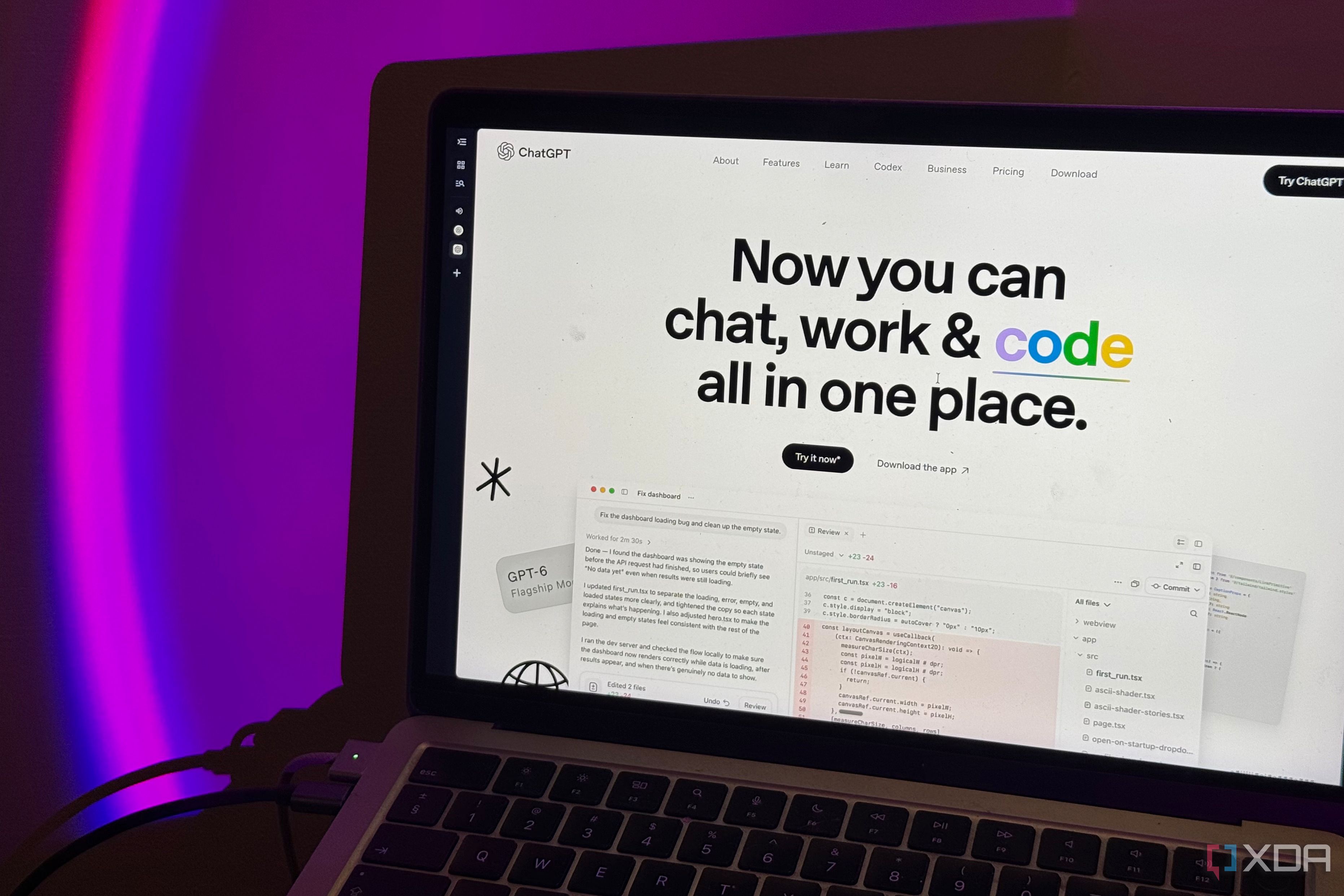 MacBook showing ChatGPT's homepage with code highlighted in color above a coding demo