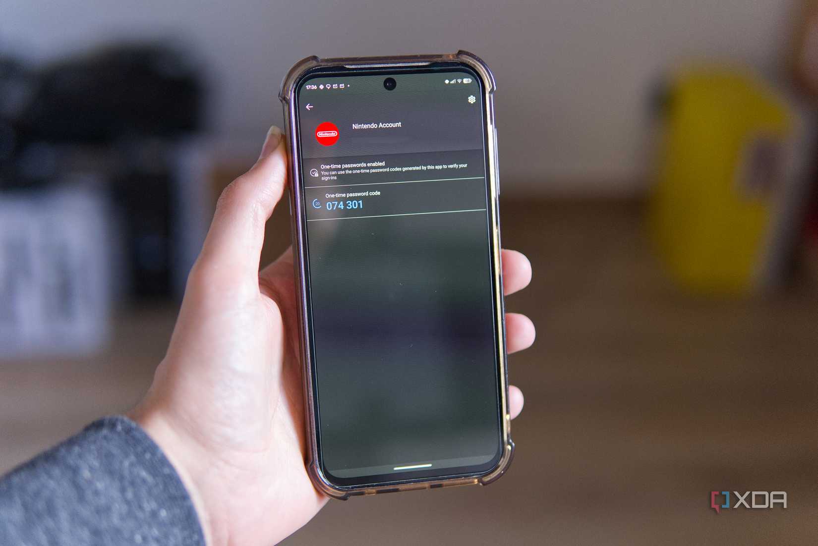 A smartphone showing a login code for a Nintendo account in Microsoft Authenticator