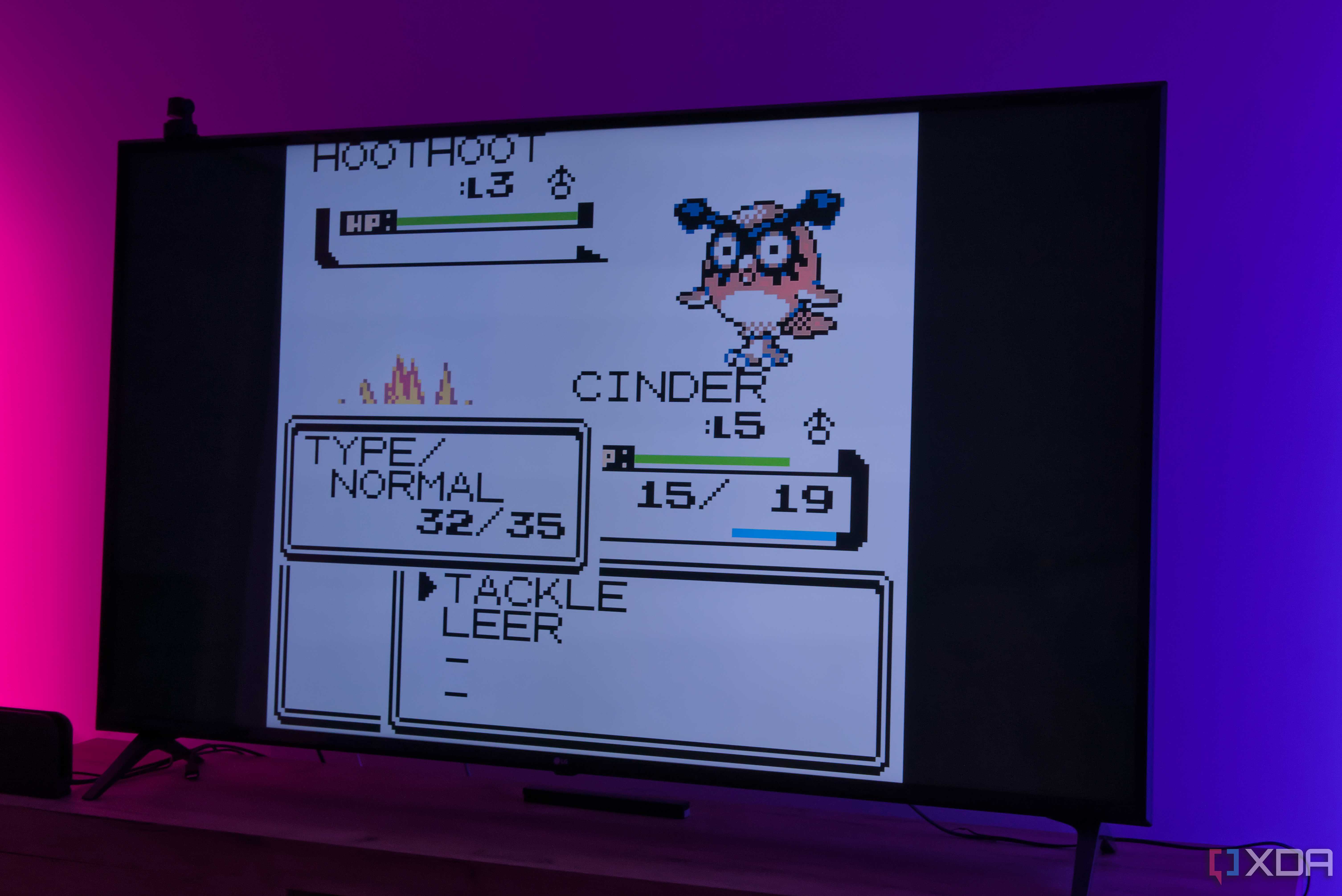 A TV displaying a battle scene in Pokémon Crystal running on RetroArch