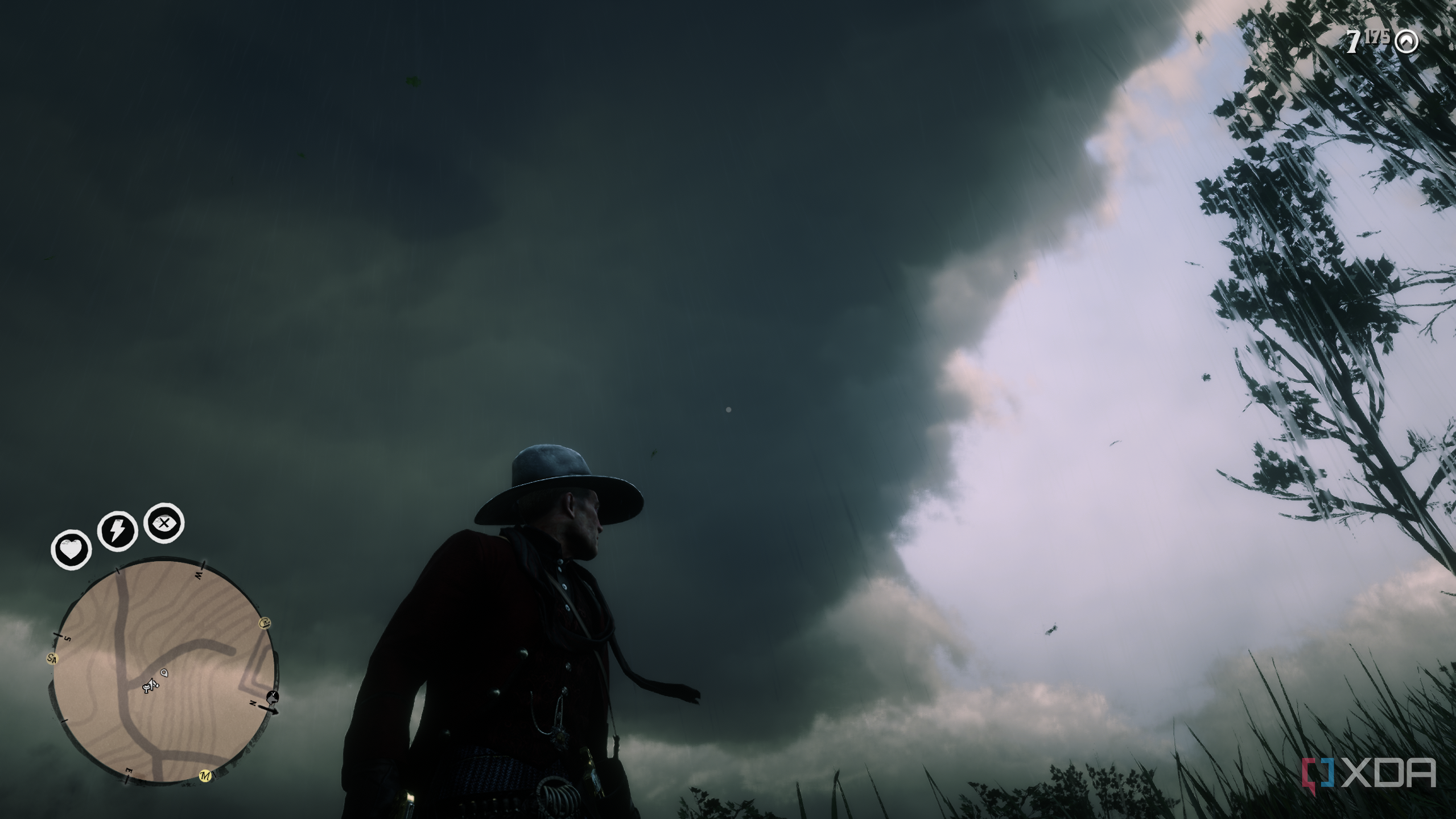 A gameplay screenshot from Red Dead Redemption 2 featuring low-level cumulus clouds.