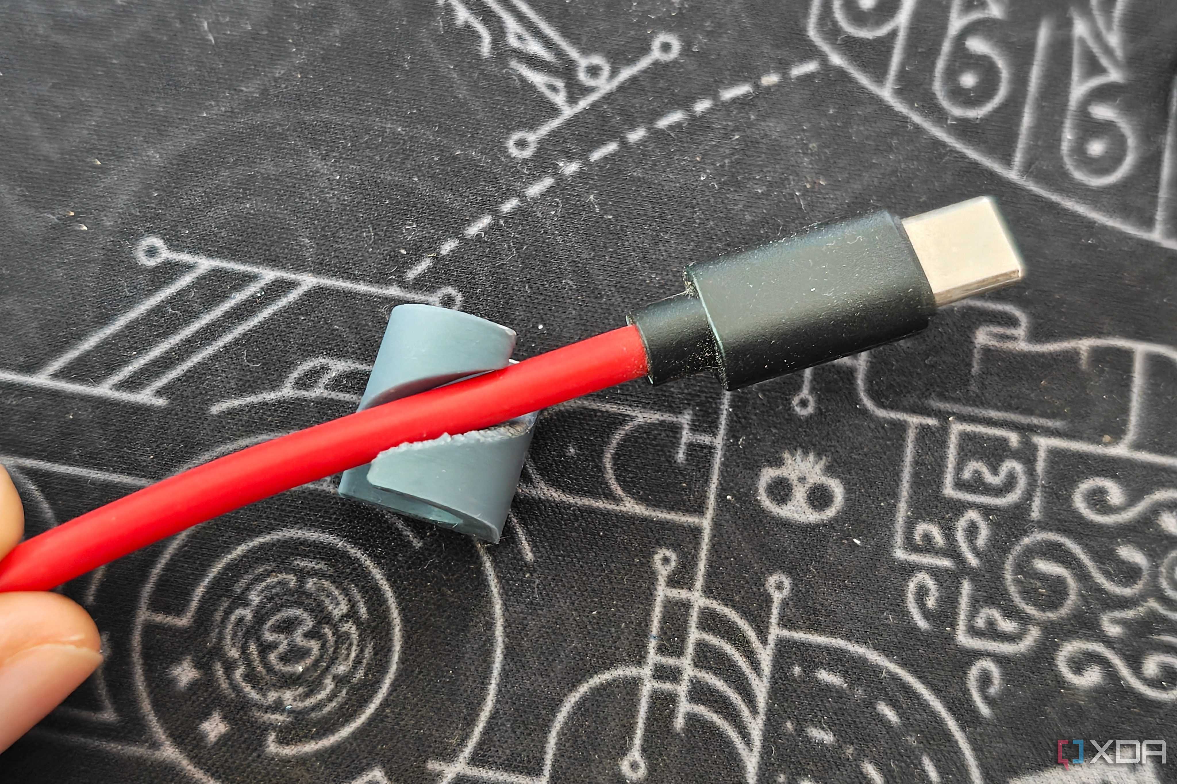 red cablethrough grey cable manager