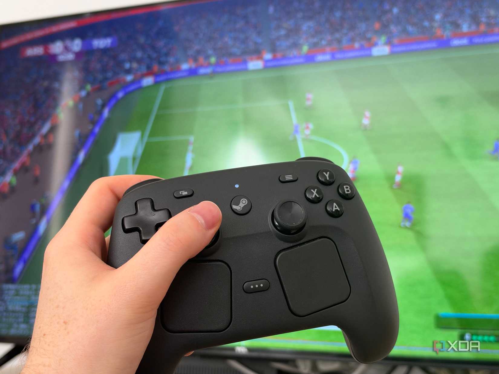 Steam Controller in front of a Steam Remote Play session
