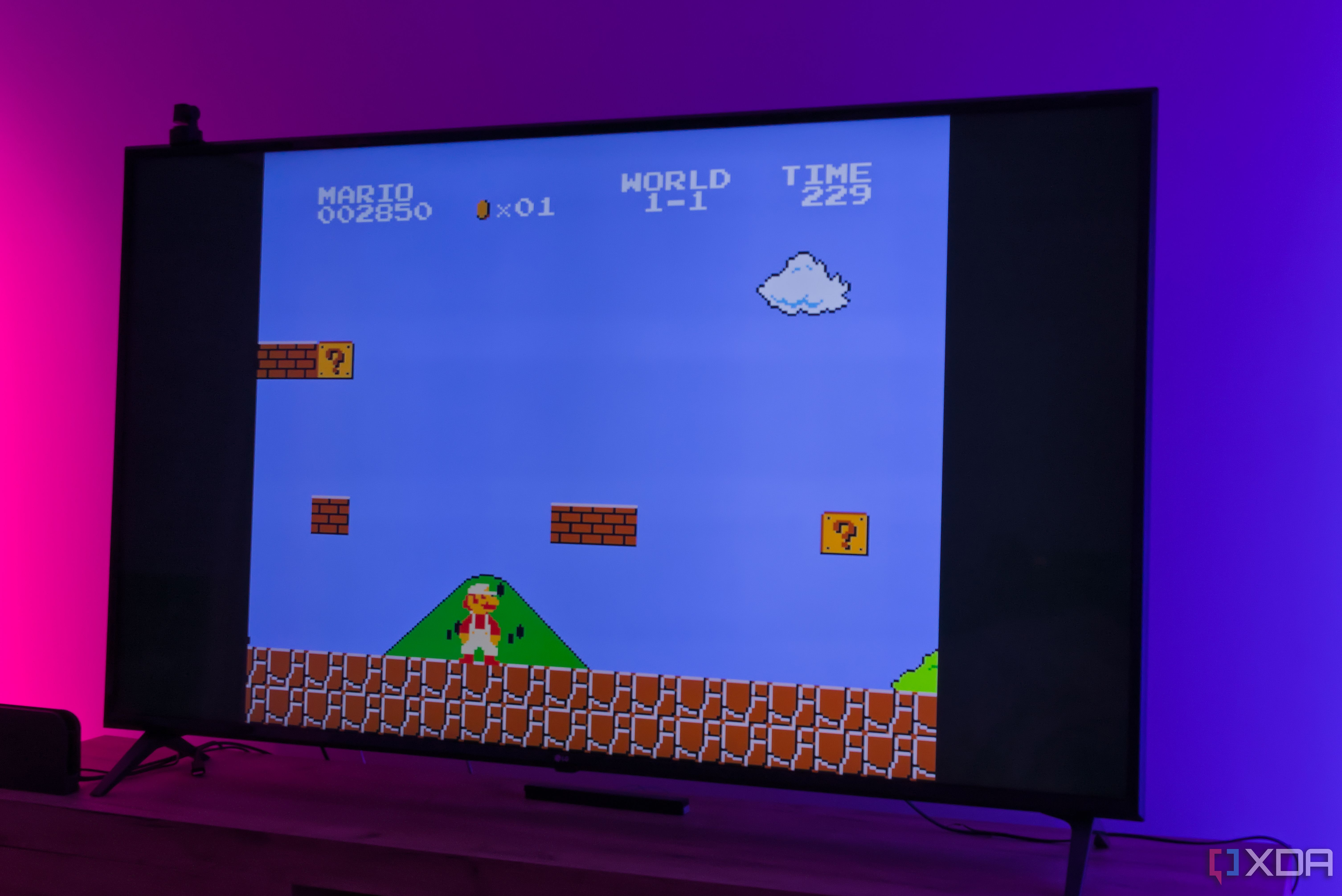 A TV displaying a level in Super Mario Bros. running on RetroArch