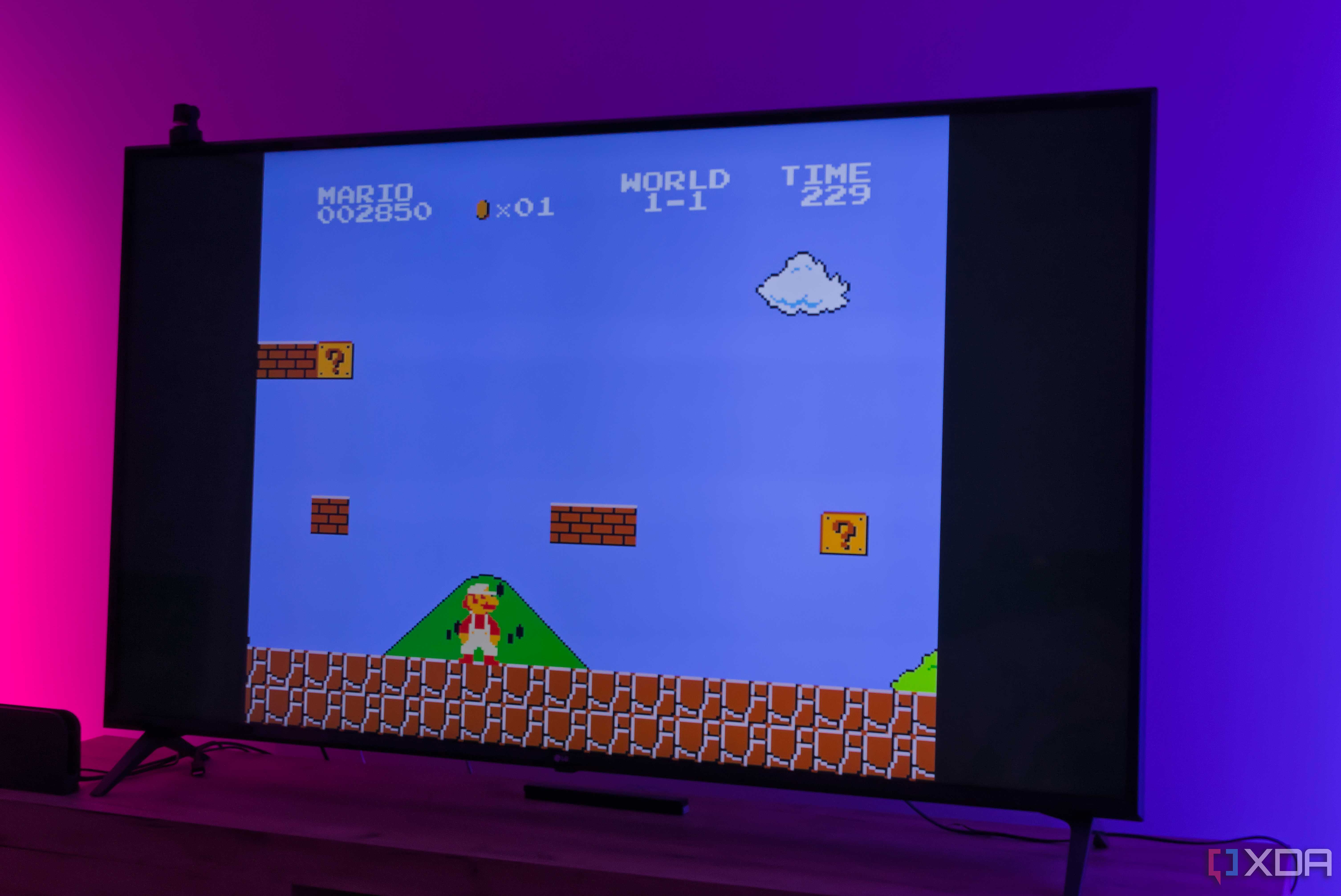 A TV displaying a level in Super Mario Bros. running on RetroArch