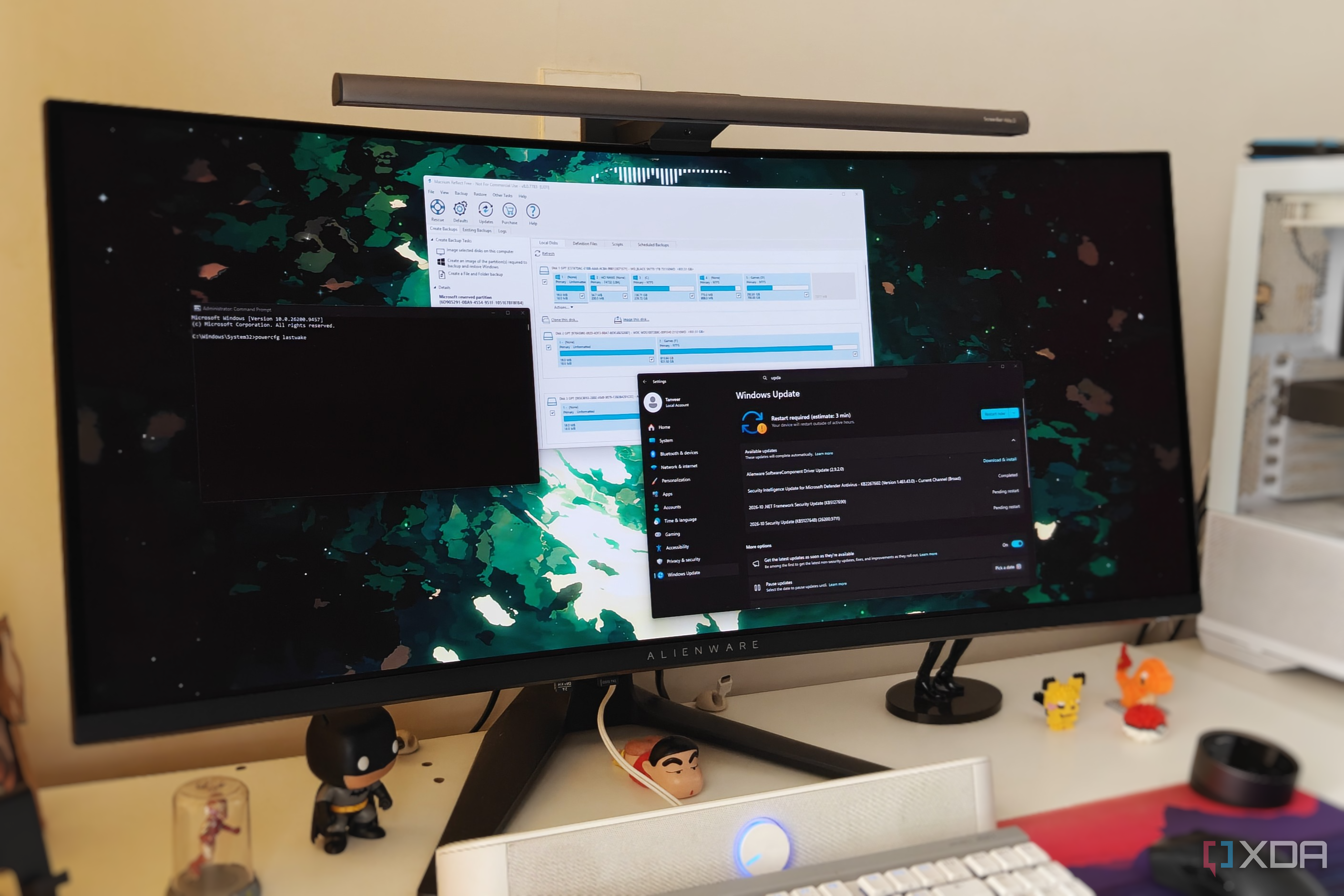 An ultrawide monitor showing a Windows 11 desktop with some open windows