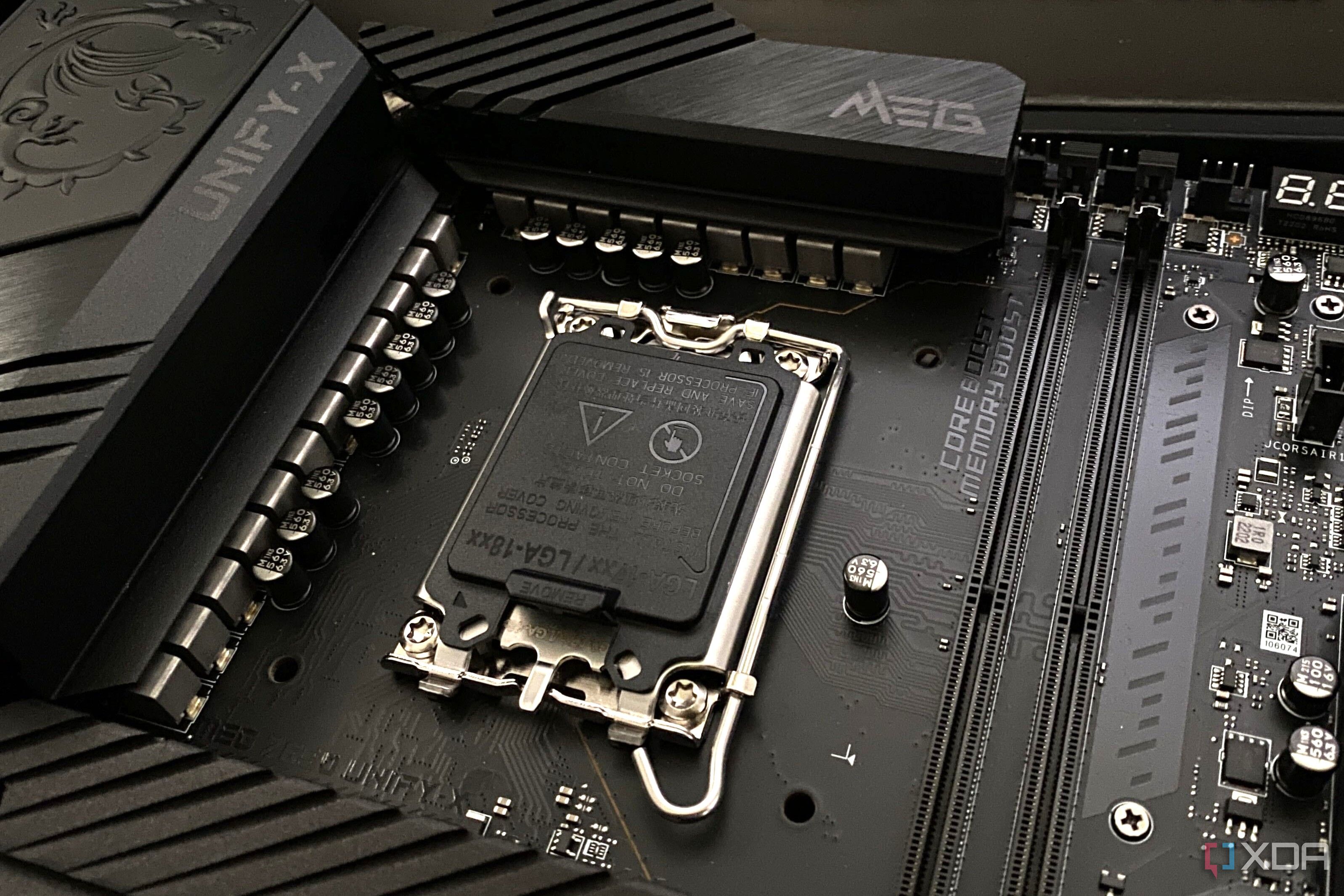 A Z690 motherboard showing a socket cover on the LGA 1700 socket