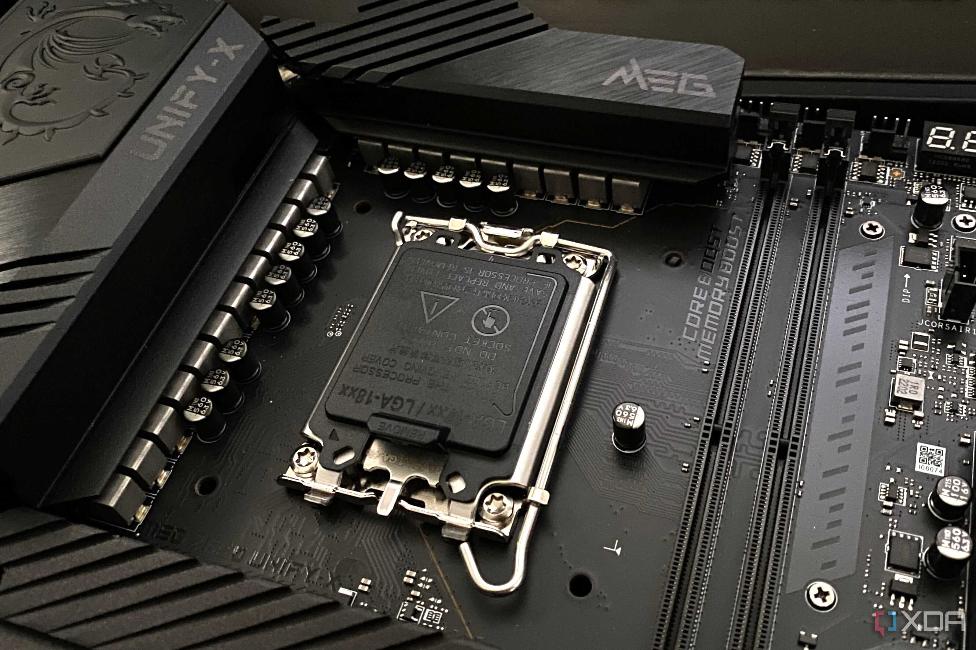 A Z690 motherboard showing a socket cover on the LGA 1700 socket